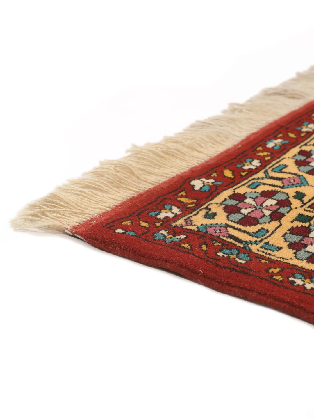 Hand-knotted Turkaman rug from the Middle East featuring a red and beige geometric pattern