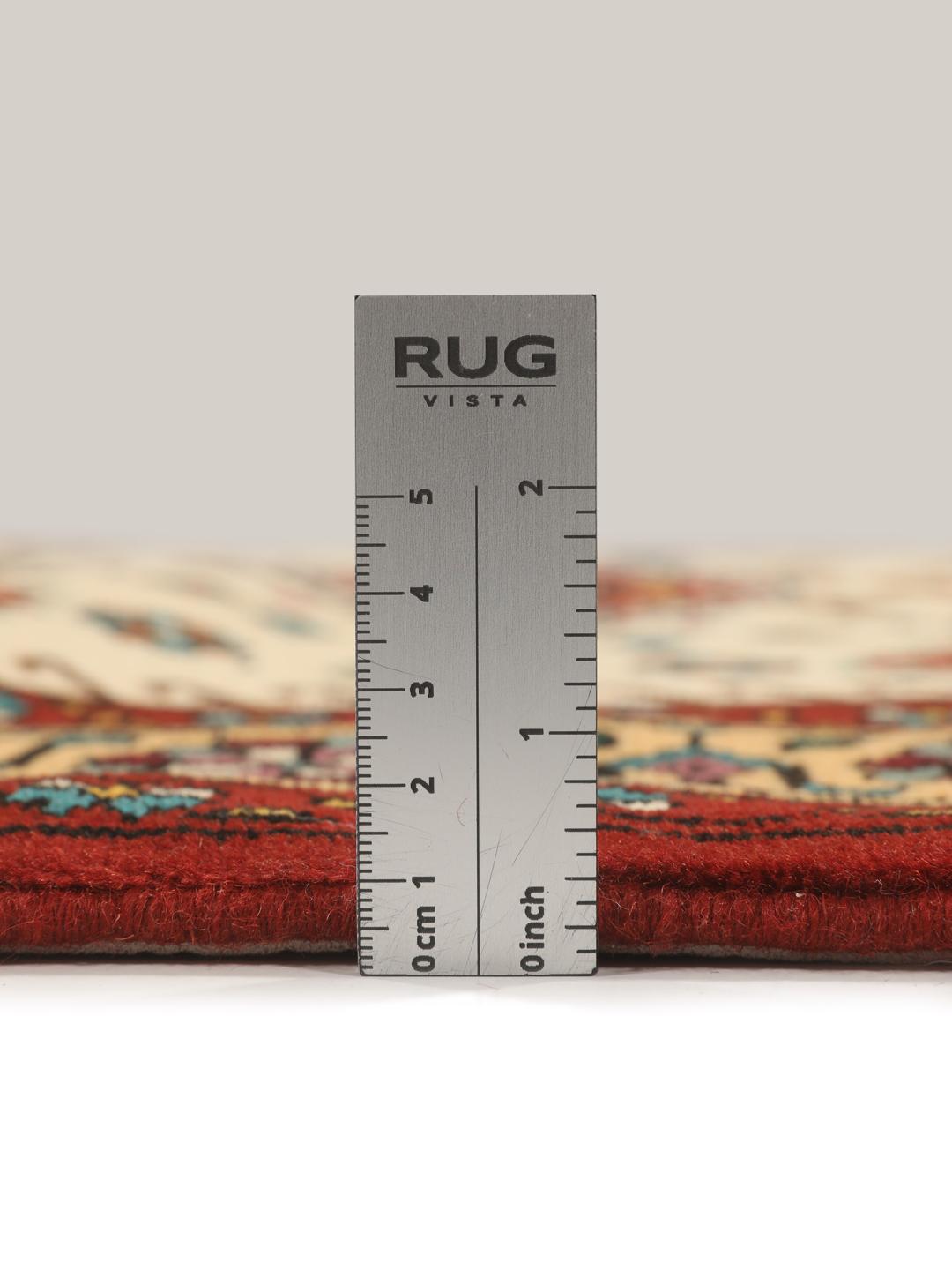 Hand-knotted Turkaman rug from the Middle East featuring a red and beige geometric pattern