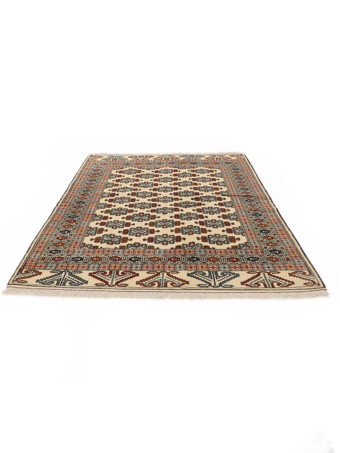 Hand-knotted Turkaman rug from the Middle East in beige