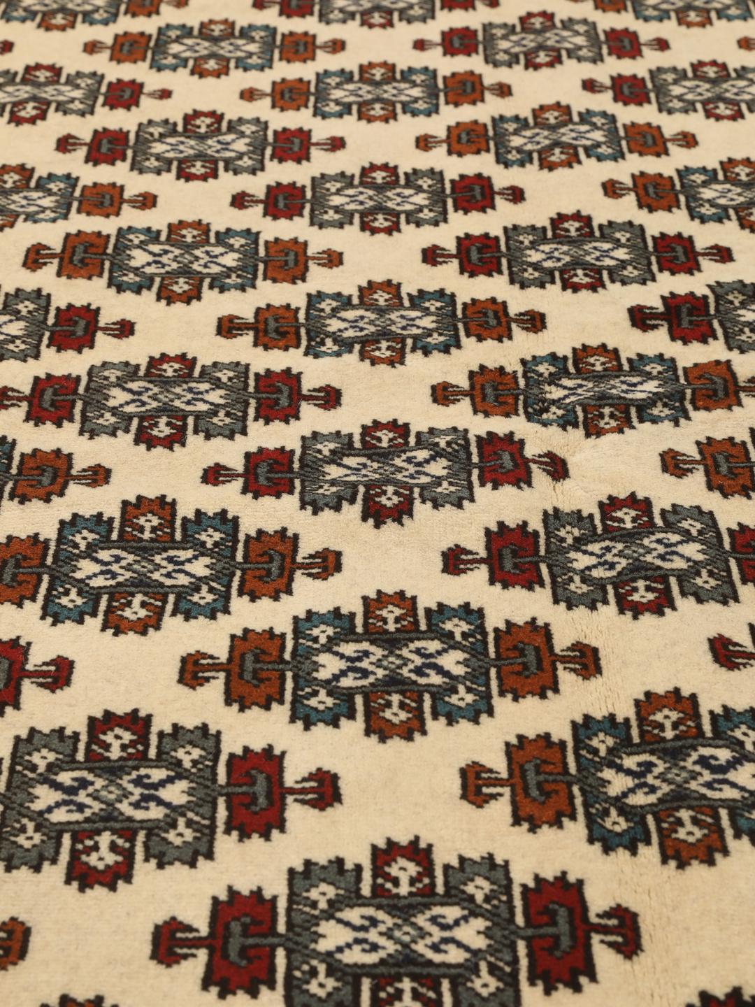 Hand-knotted Turkaman rug from the Middle East in beige