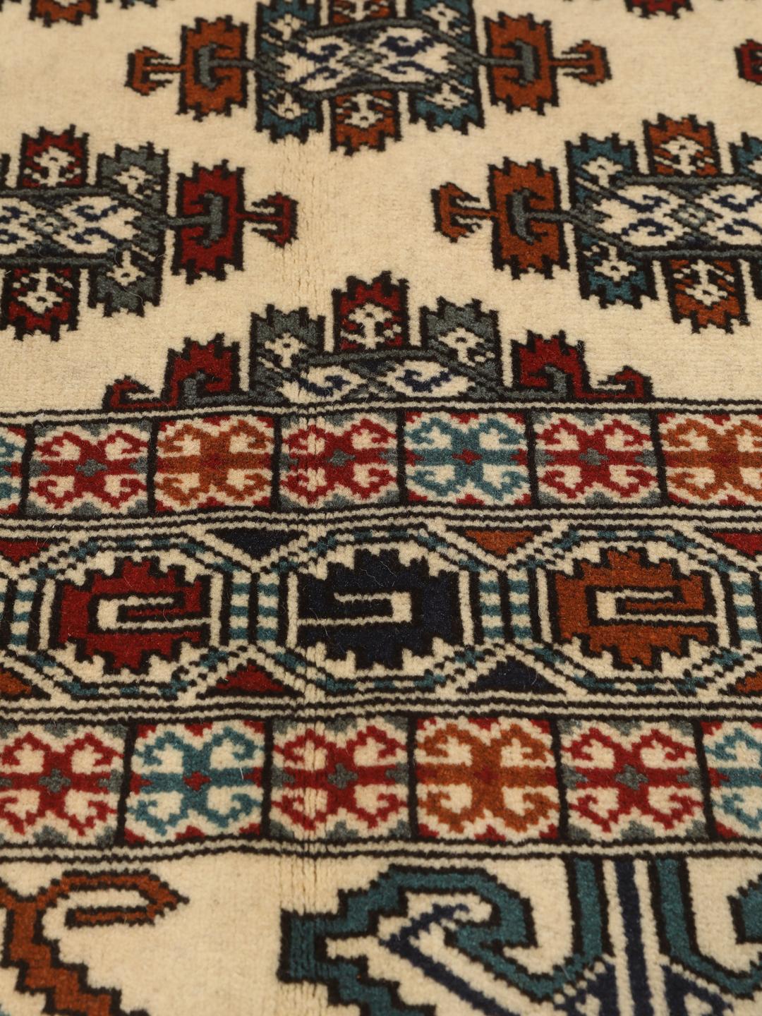 Hand-knotted Turkaman rug from the Middle East in beige
