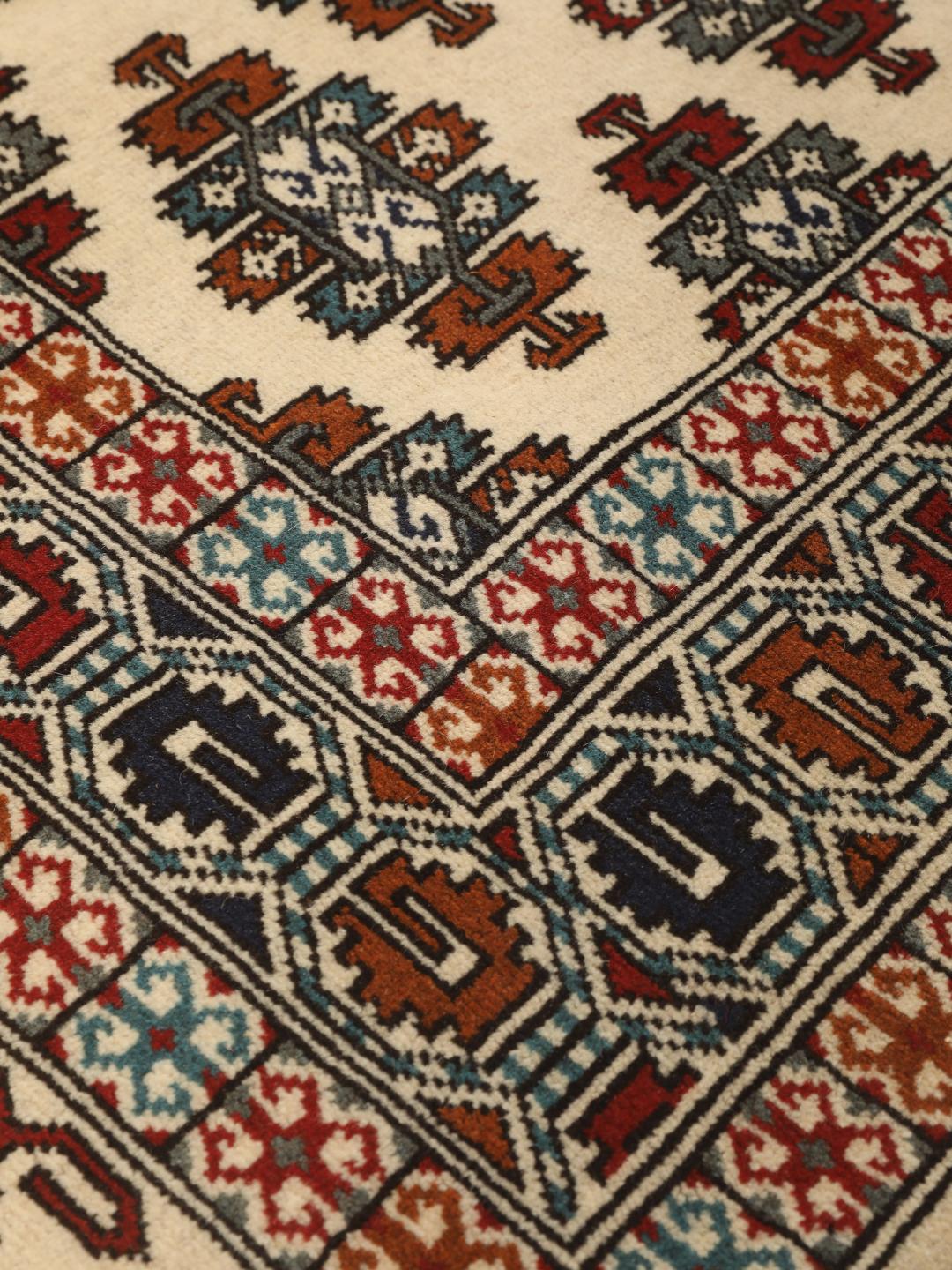Hand-knotted Turkaman rug from the Middle East in beige