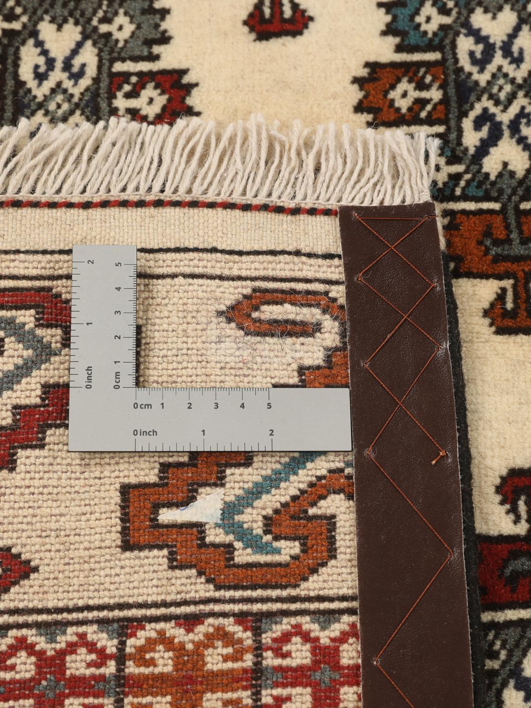 Hand-knotted Turkaman rug from the Middle East in beige
