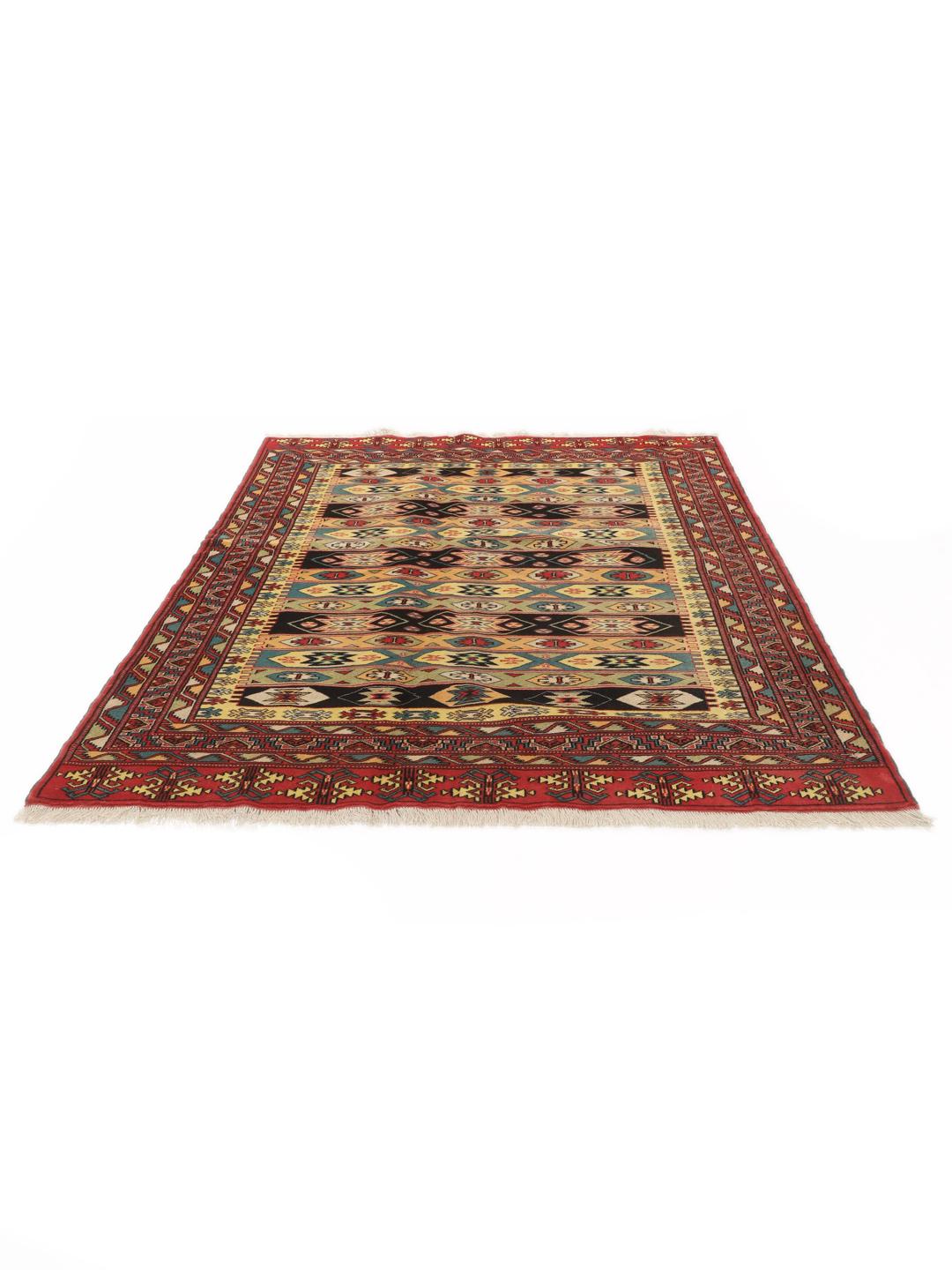 Hand-knotted Turkaman rug from the Middle East in vibrant red and geometric patterns