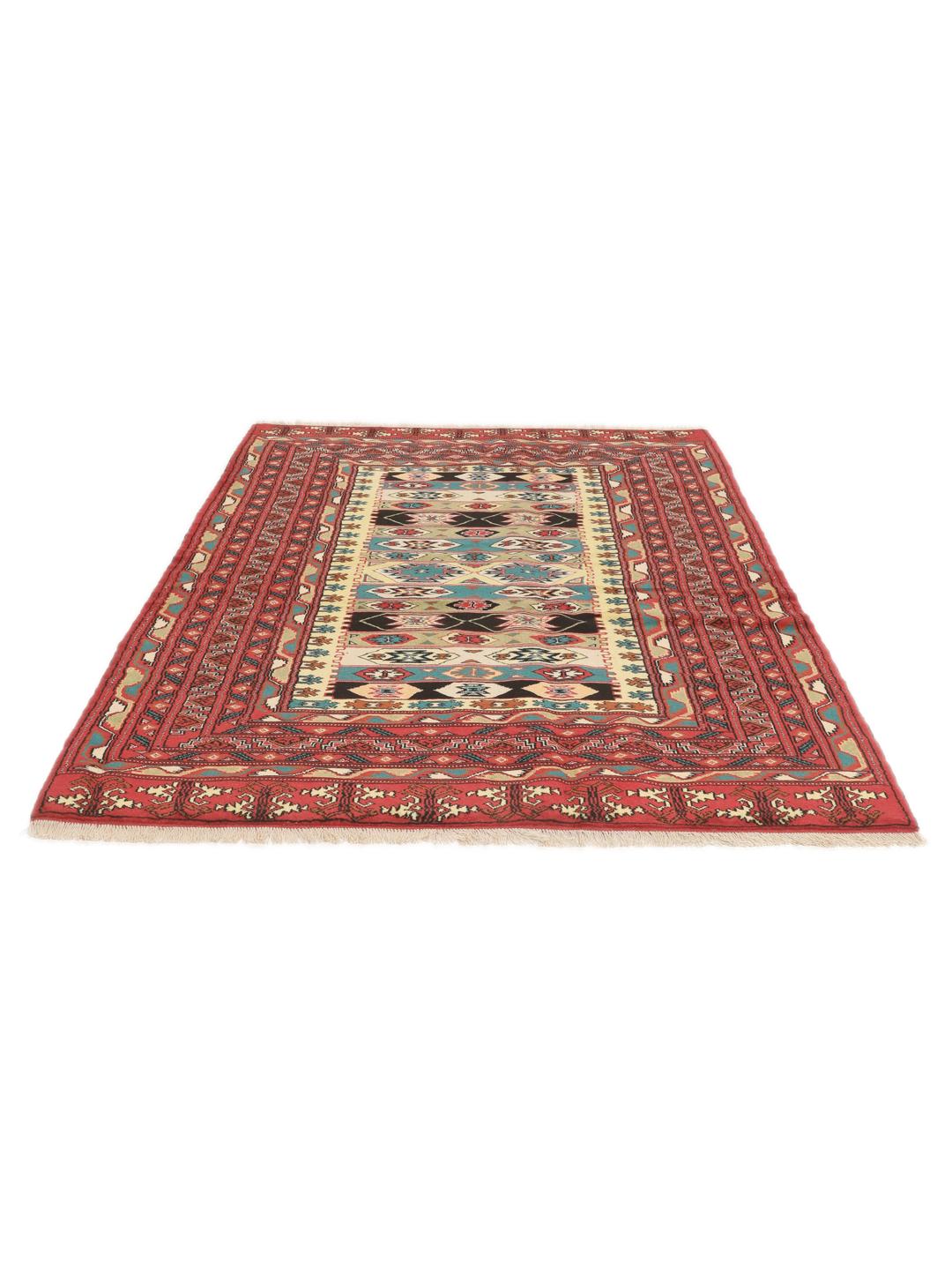 A hand-knotted Turkaman rug from the Middle East with a vibrant red and multicoloured geometric design.