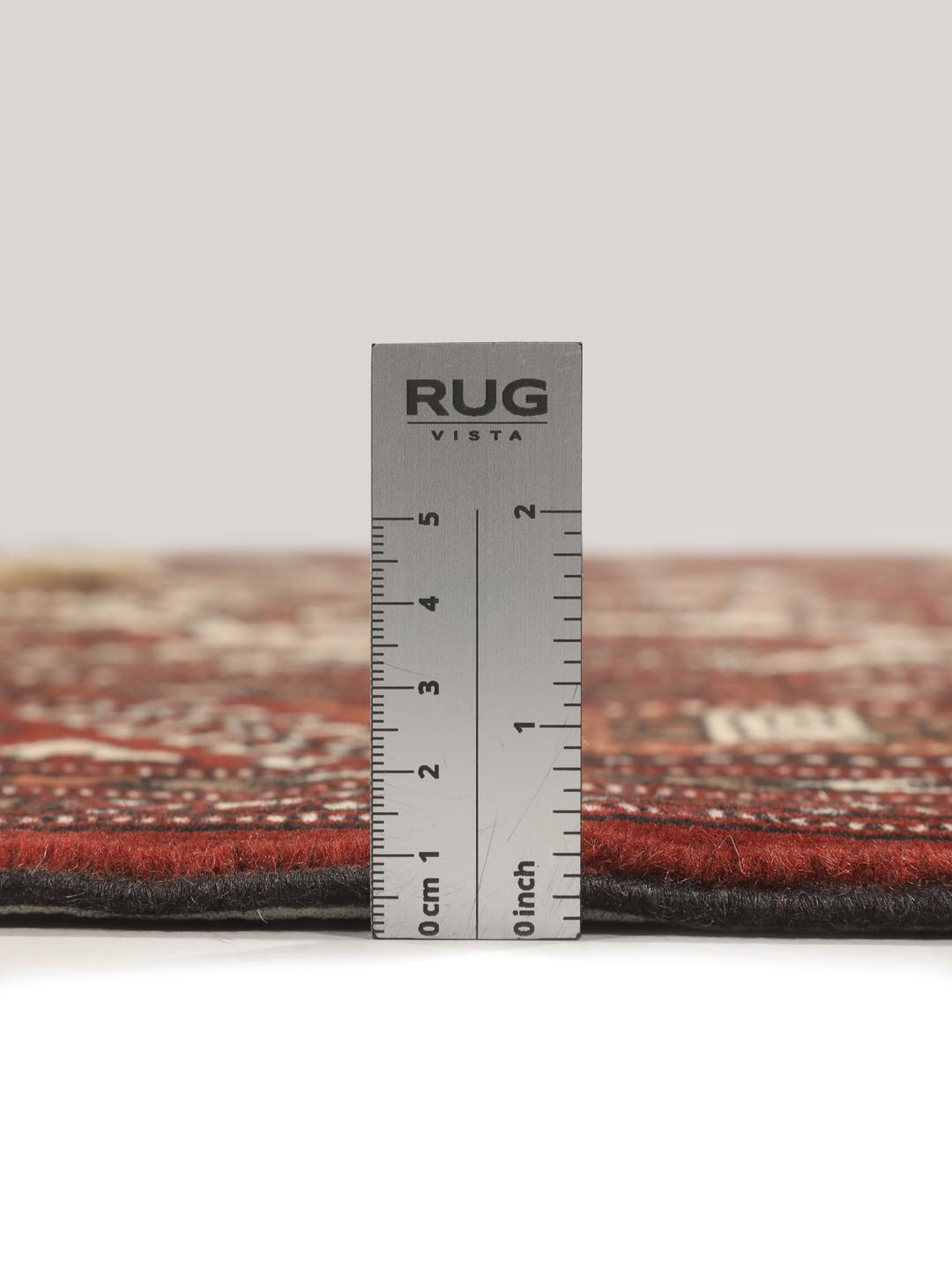 Hand-knotted Turkaman rug from the Middle East in red