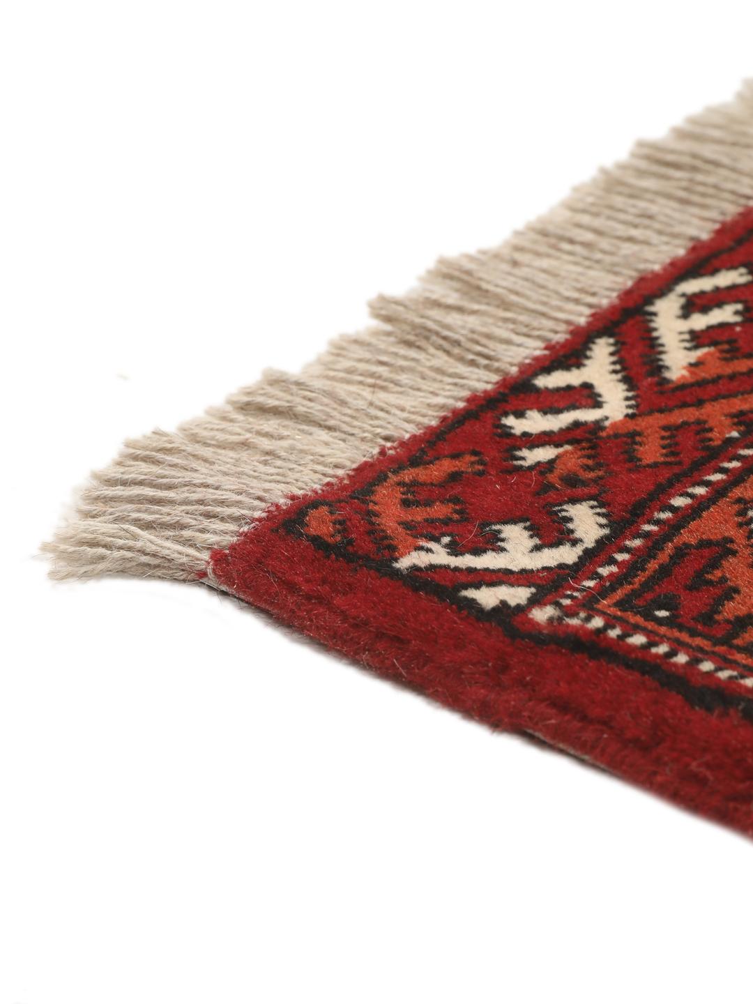 Hand-knotted Middle Eastern Turkaman rug in red and beige tones