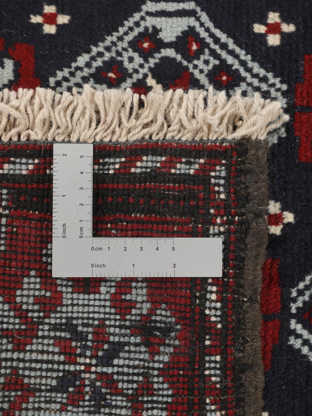 Håndknyttet Baluch-tæppe med et mørkerødt og blåt mønster fra Mellemøsten