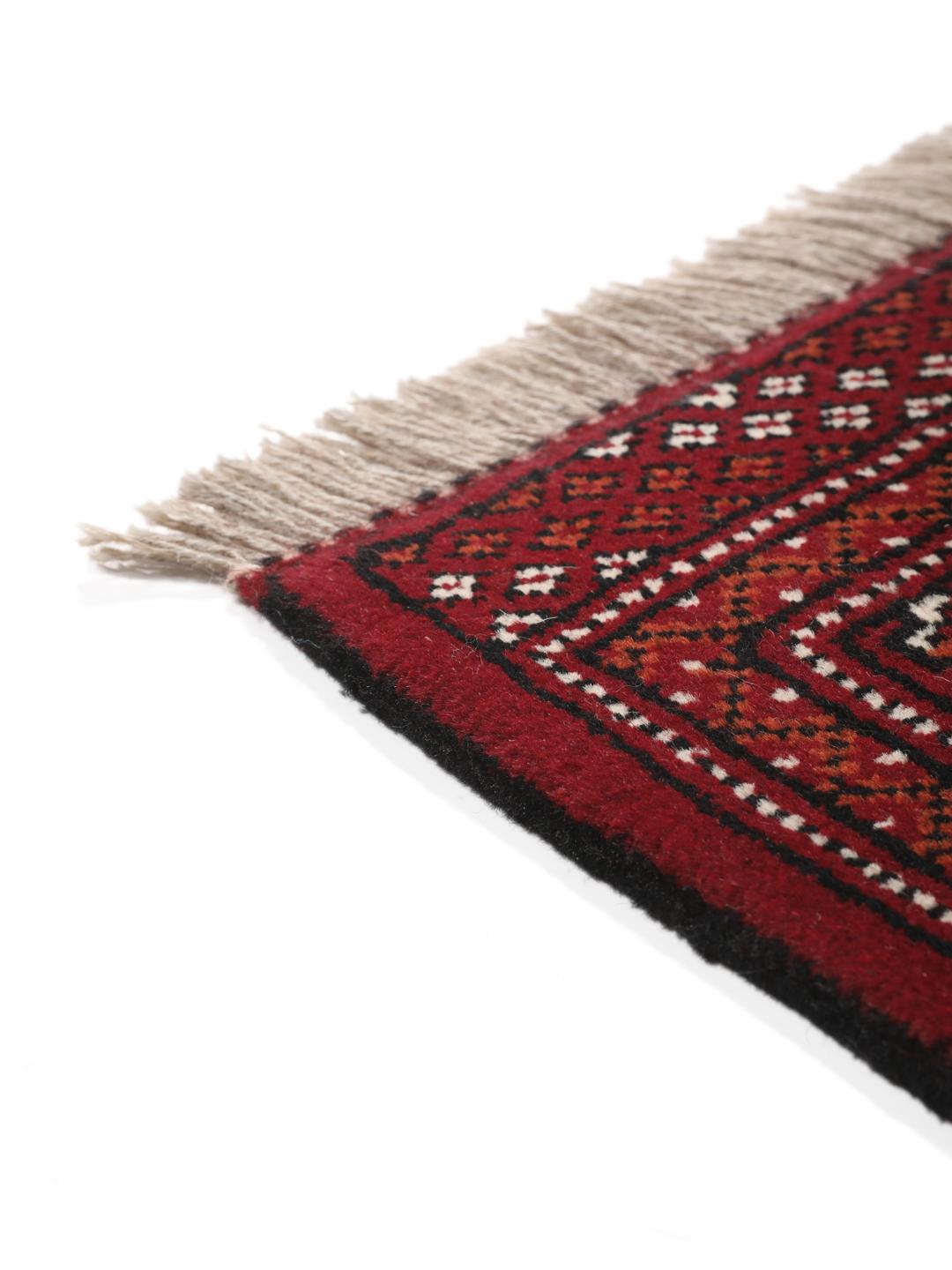 Hand-knotted Turkaman rug from the Middle East in blue and red