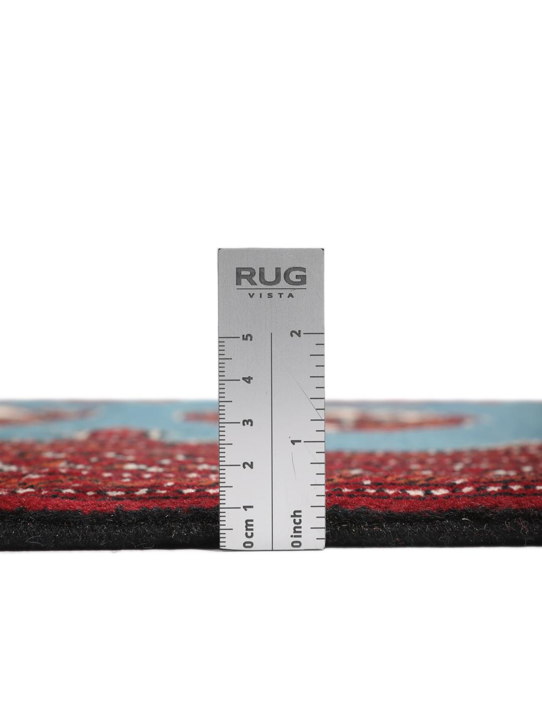 Hand-knotted Turkaman rug from the Middle East in blue and red