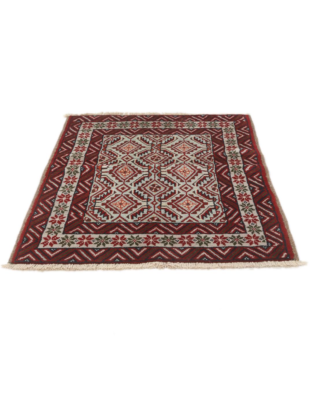Hand-knotted Baluch rug with geometric motifs and red tones from the Middle East