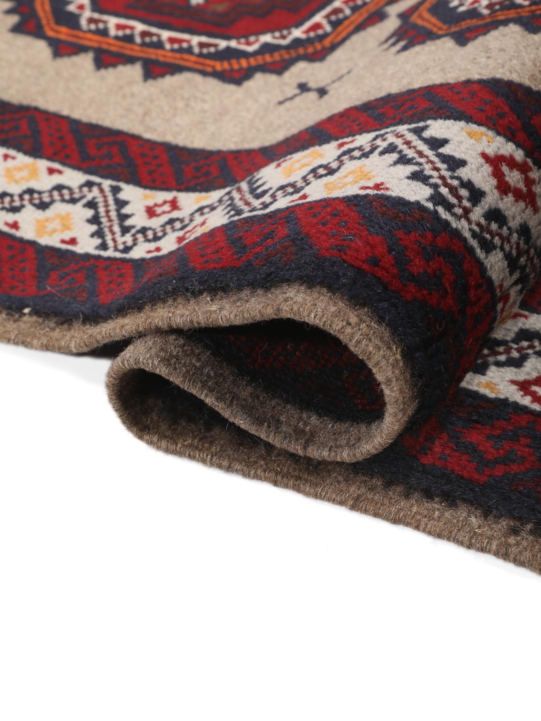 Hand-knotted Middle Eastern Baluch rug in red and beige tones