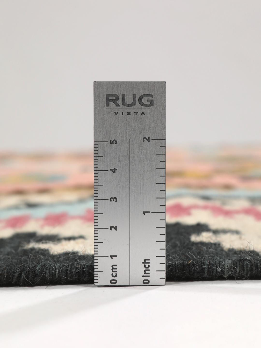 Handgeweven wollen tapijt in roze en blauw