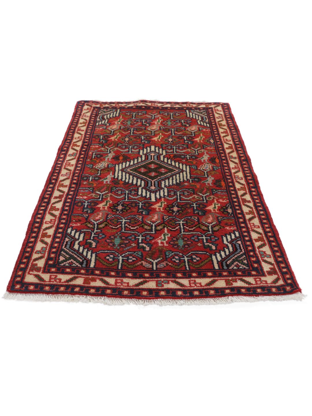 Hand-knotted Asadabad rug from the Middle East with a vibrant red field and geometric patterns