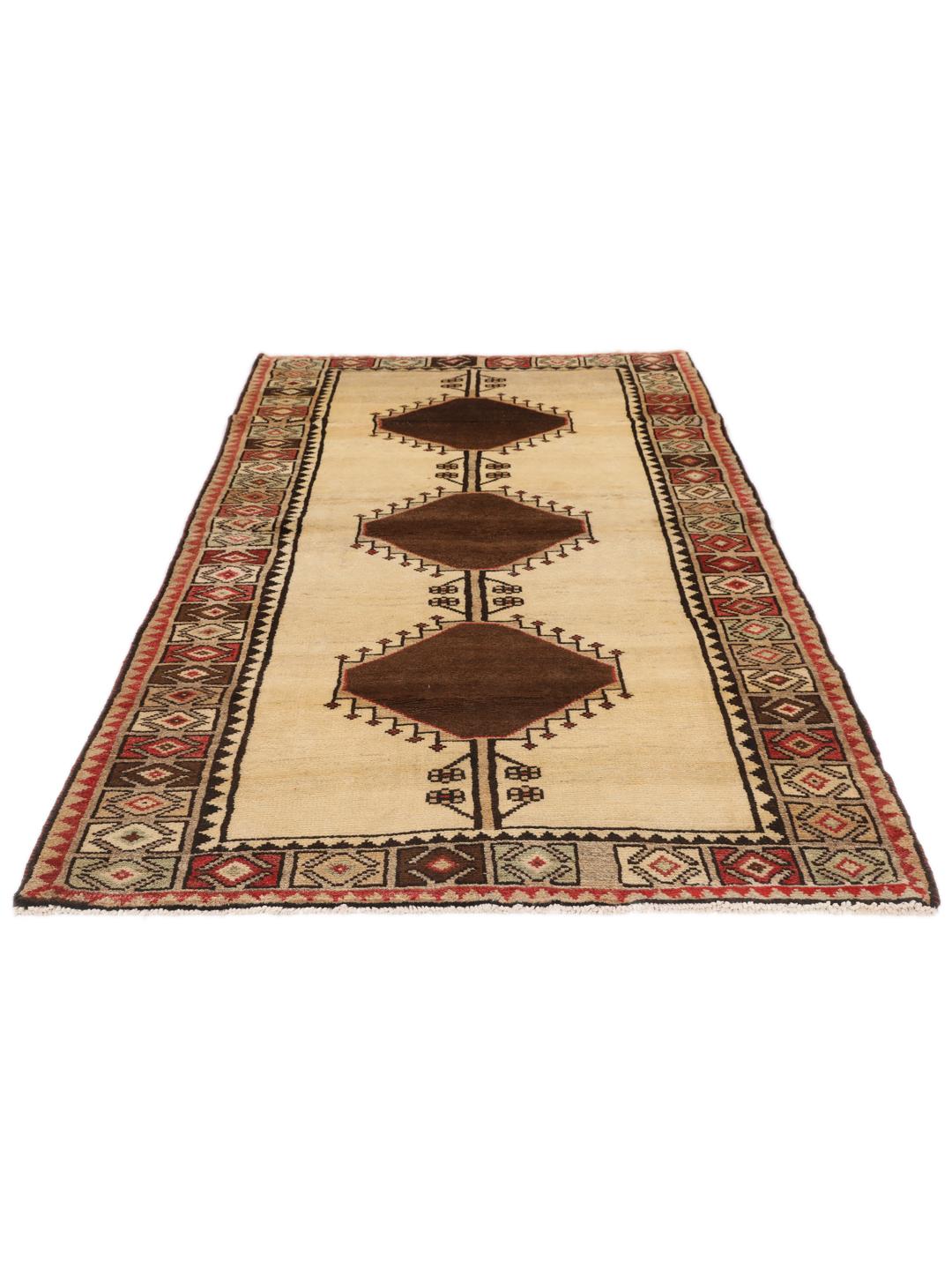 Håndknyttet Lori-tæppe fra Mellemøsten med beige bund og geometriske motiver.