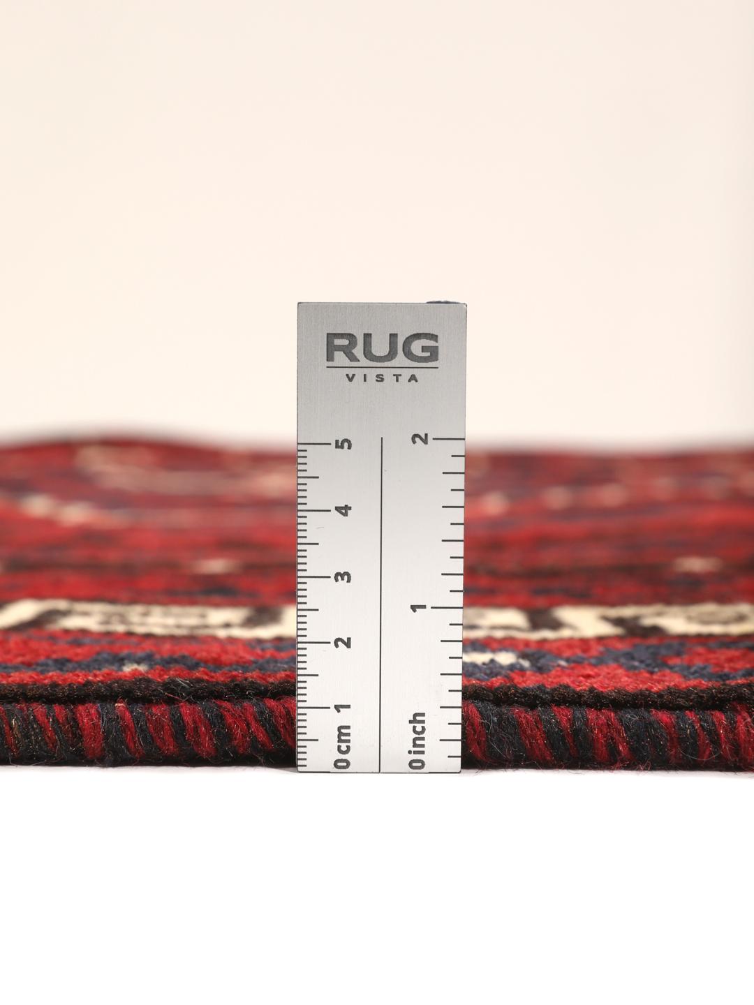 Hand-knotted Lori rug from the Middle East in dark red tones
