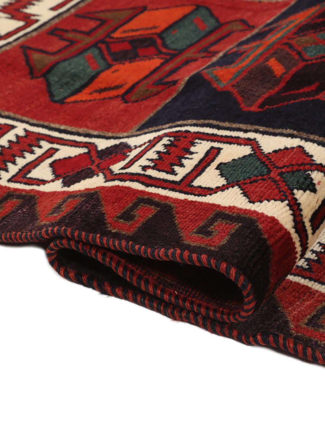 Handgeknoopt Lori-tapijt uit het Midden-Oosten met een donkerrood en donkerblauw geometrisch patroon