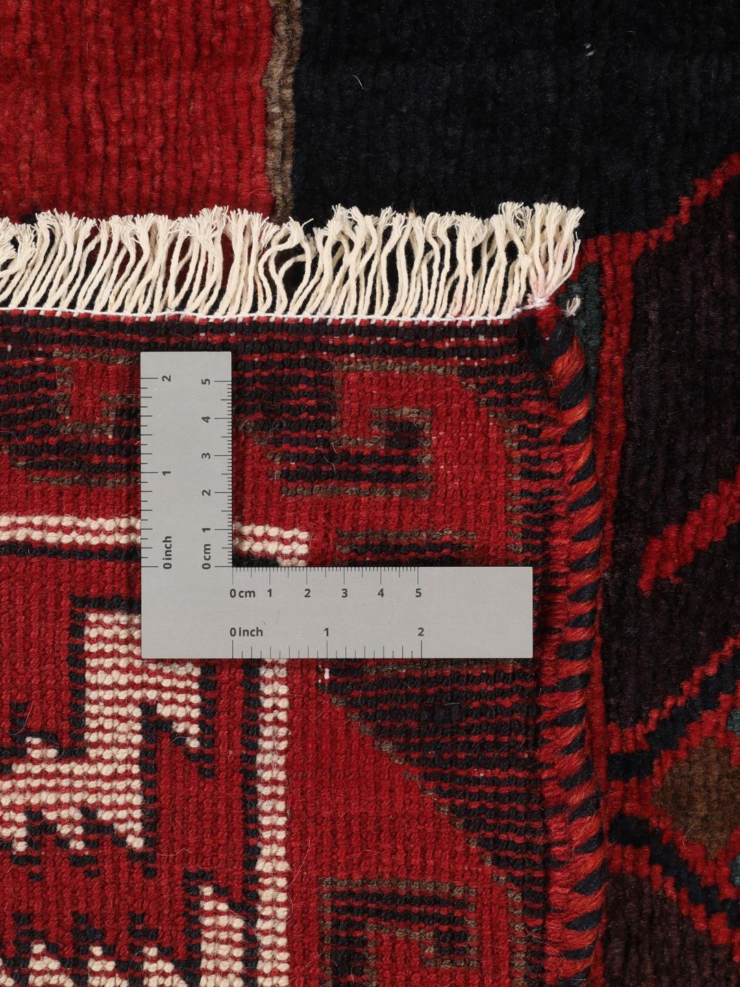 Handgeknoopt Lori-tapijt uit het Midden-Oosten met een donkerrood en donkerblauw geometrisch patroon