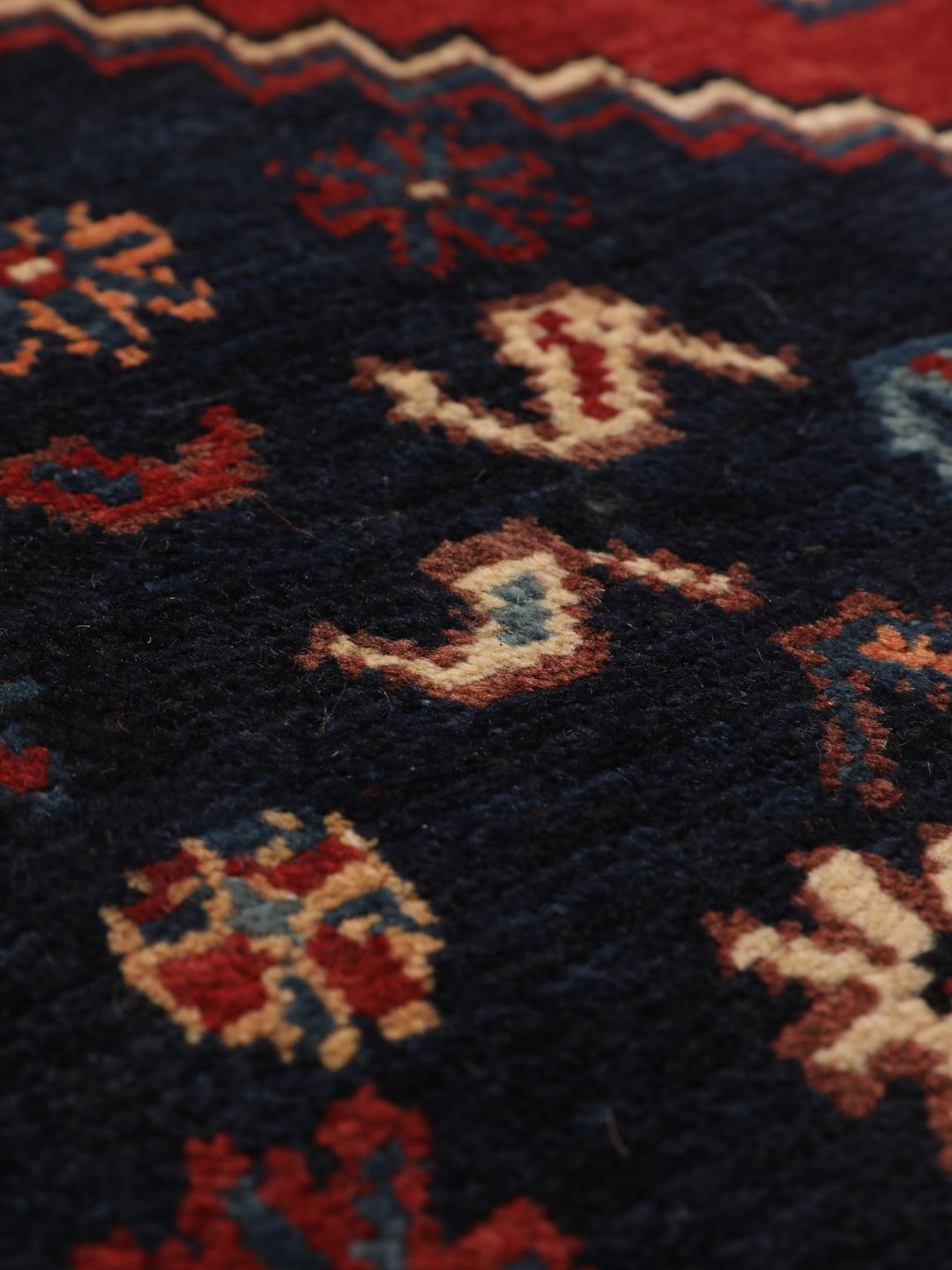 Hand-knotted Afshar rug from the Middle East in deep red and blue tones