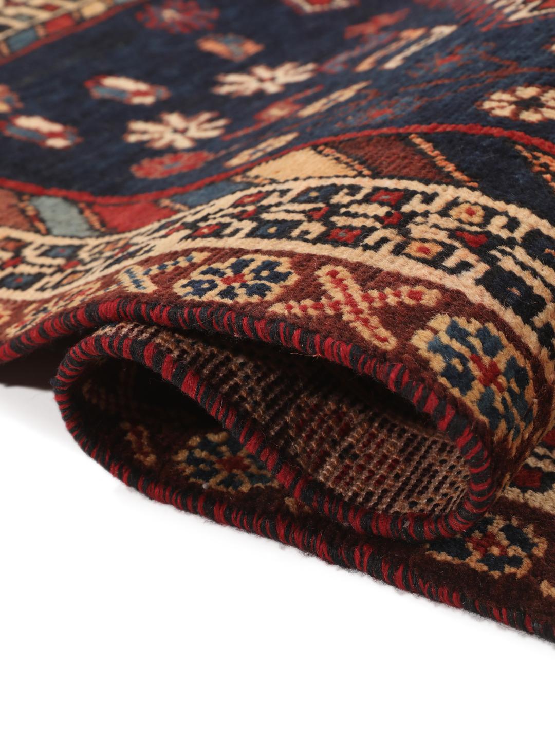 Hand-knotted Afshar rug from the Middle East in deep red and blue tones