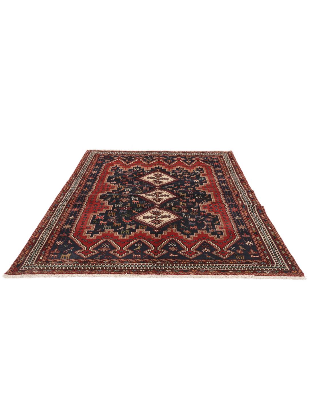 Hand-knotted Afshar rug from the Middle East featuring a red and blue field with tribal animal motifs.