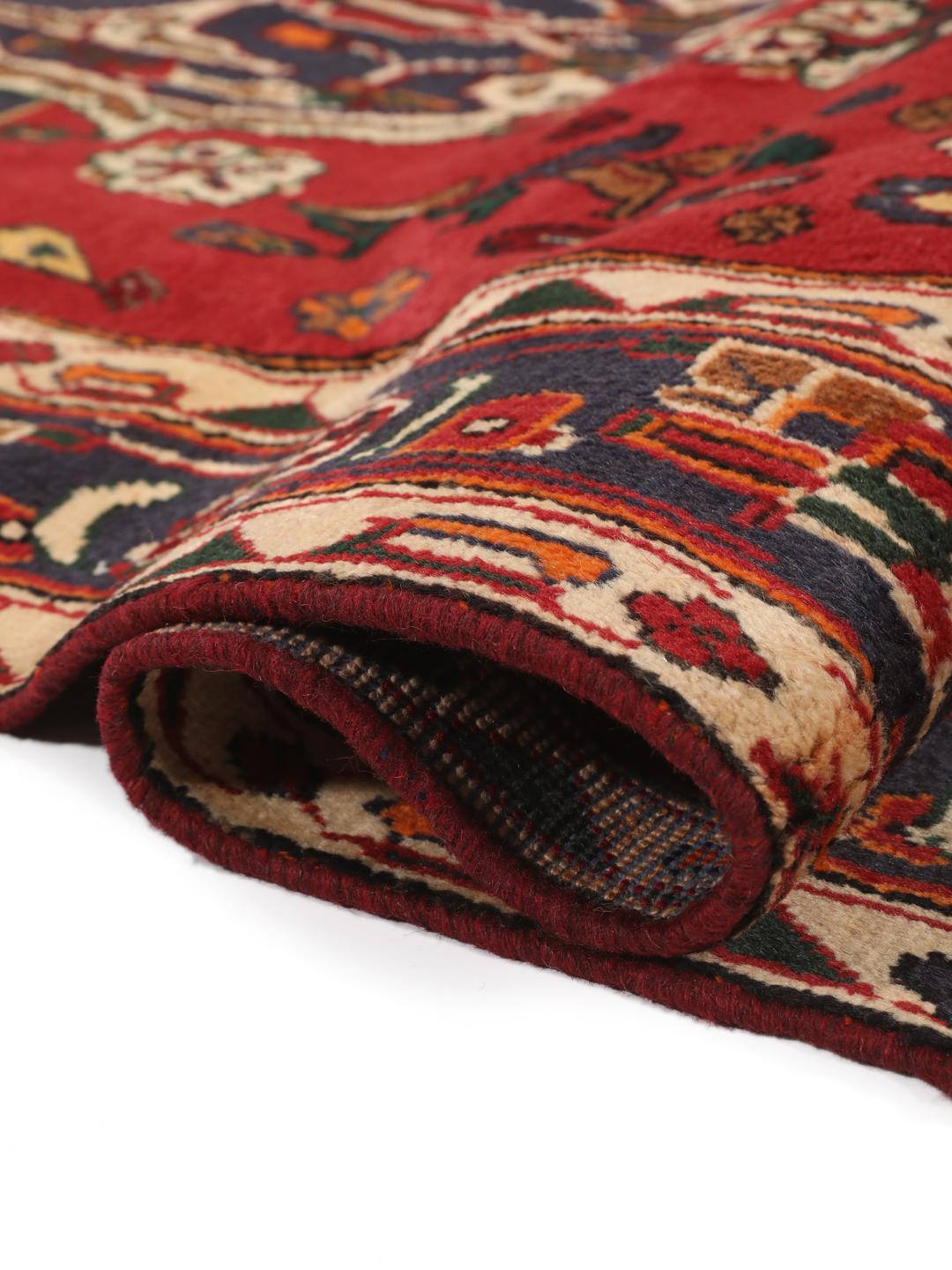 Hand-knotted red Afshar rug with traditional geometric motifs from the Middle East