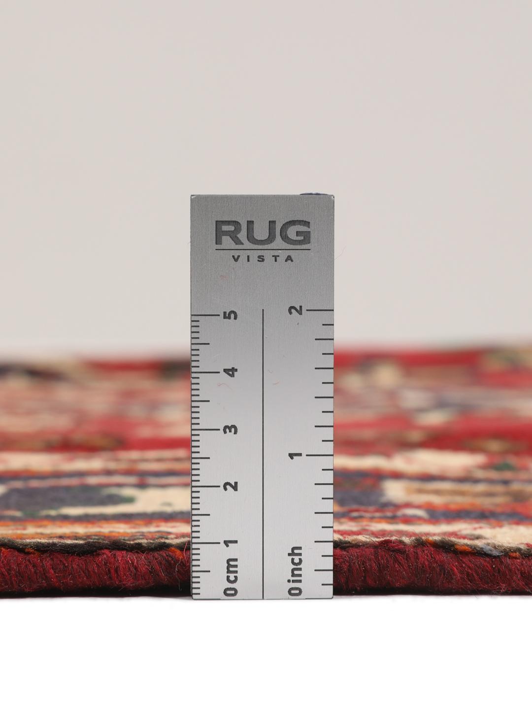 Hand-knotted red Afshar rug with traditional geometric motifs from the Middle East