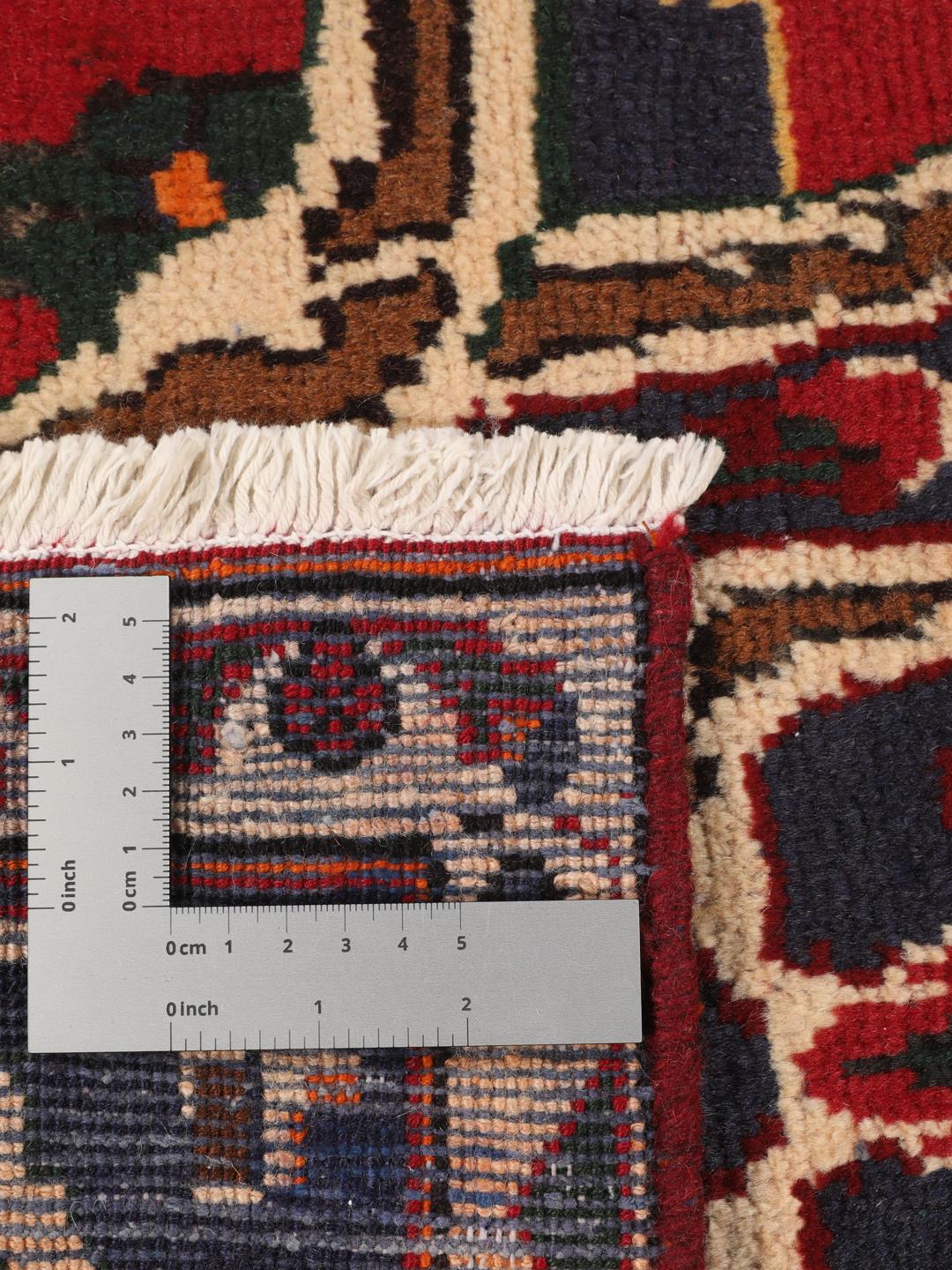 Hand-knotted red Afshar rug with traditional geometric motifs from the Middle East