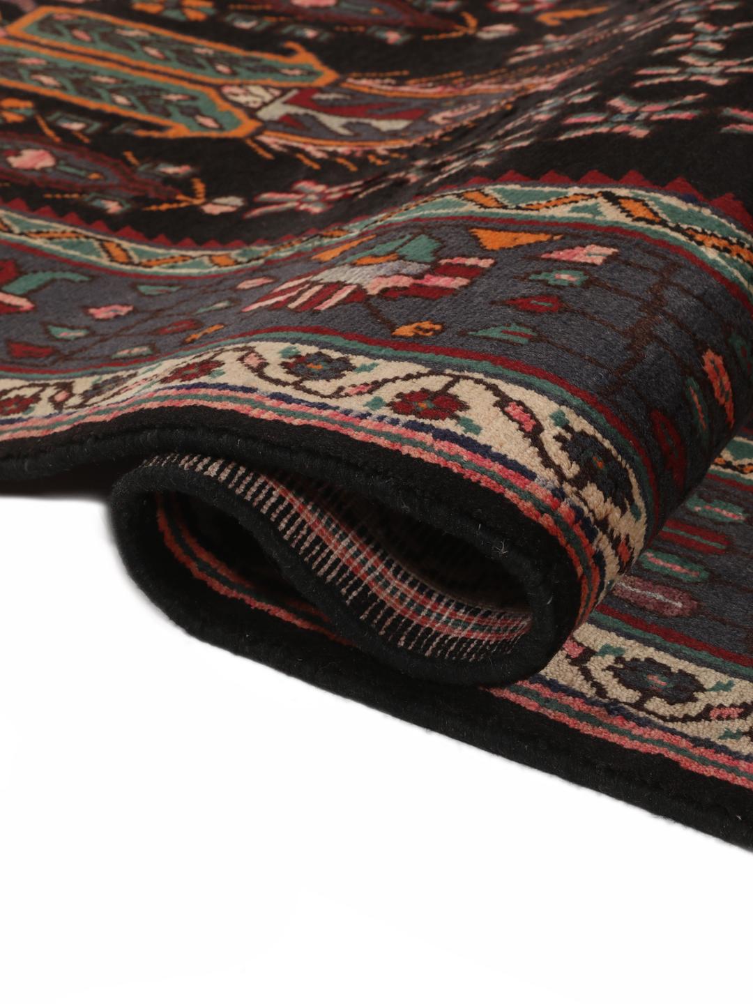 Hand-knotted Afshar rug from the Middle East featuring a dark-red and cream geometric design