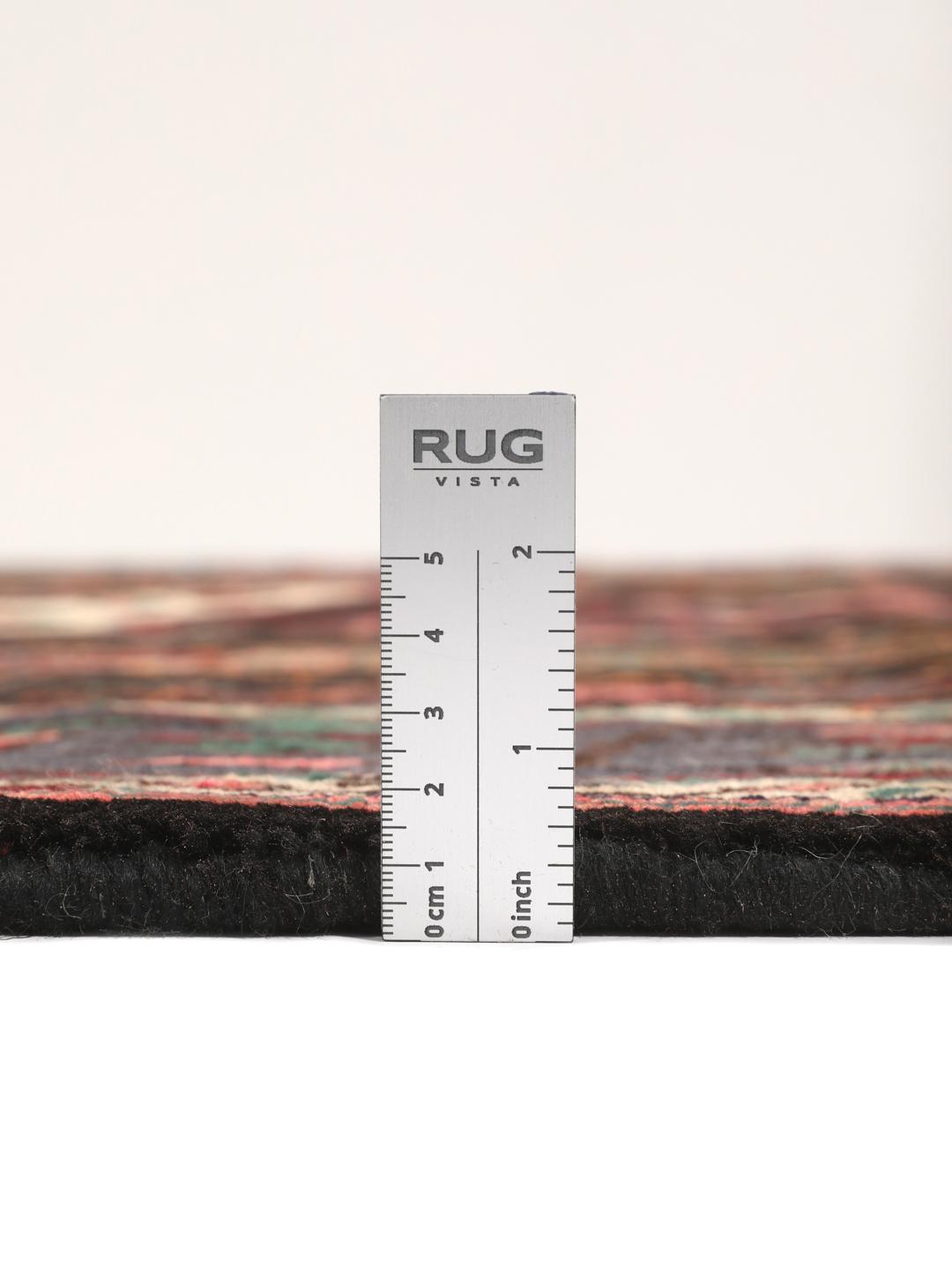 Hand-knotted Afshar rug from the Middle East featuring a dark-red and cream geometric design