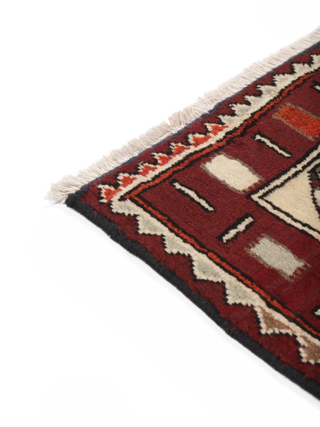 Hand-knotted Afshar rug from the Middle East in red and cream featuring pictorial motifs