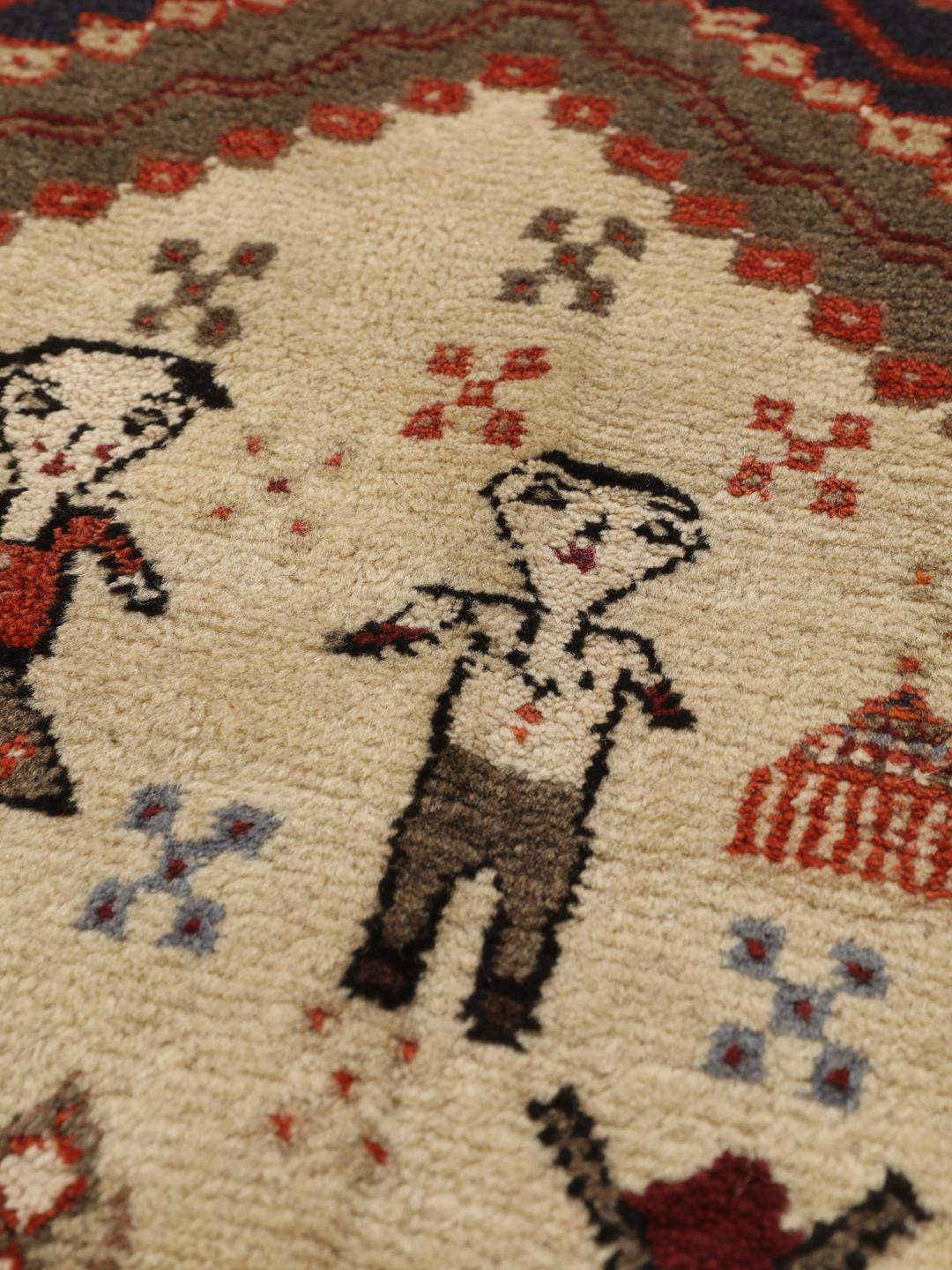 Hand-knotted Afshar rug from the Middle East in red and cream featuring pictorial motifs