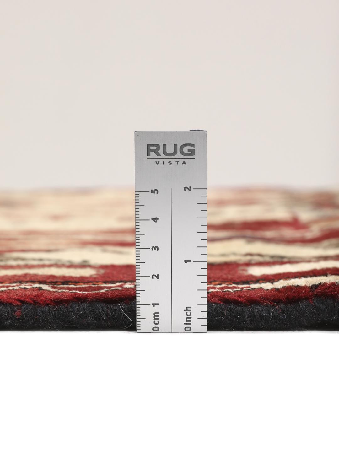 Hand-knotted Afshar rug from the Middle East in red and cream featuring pictorial motifs