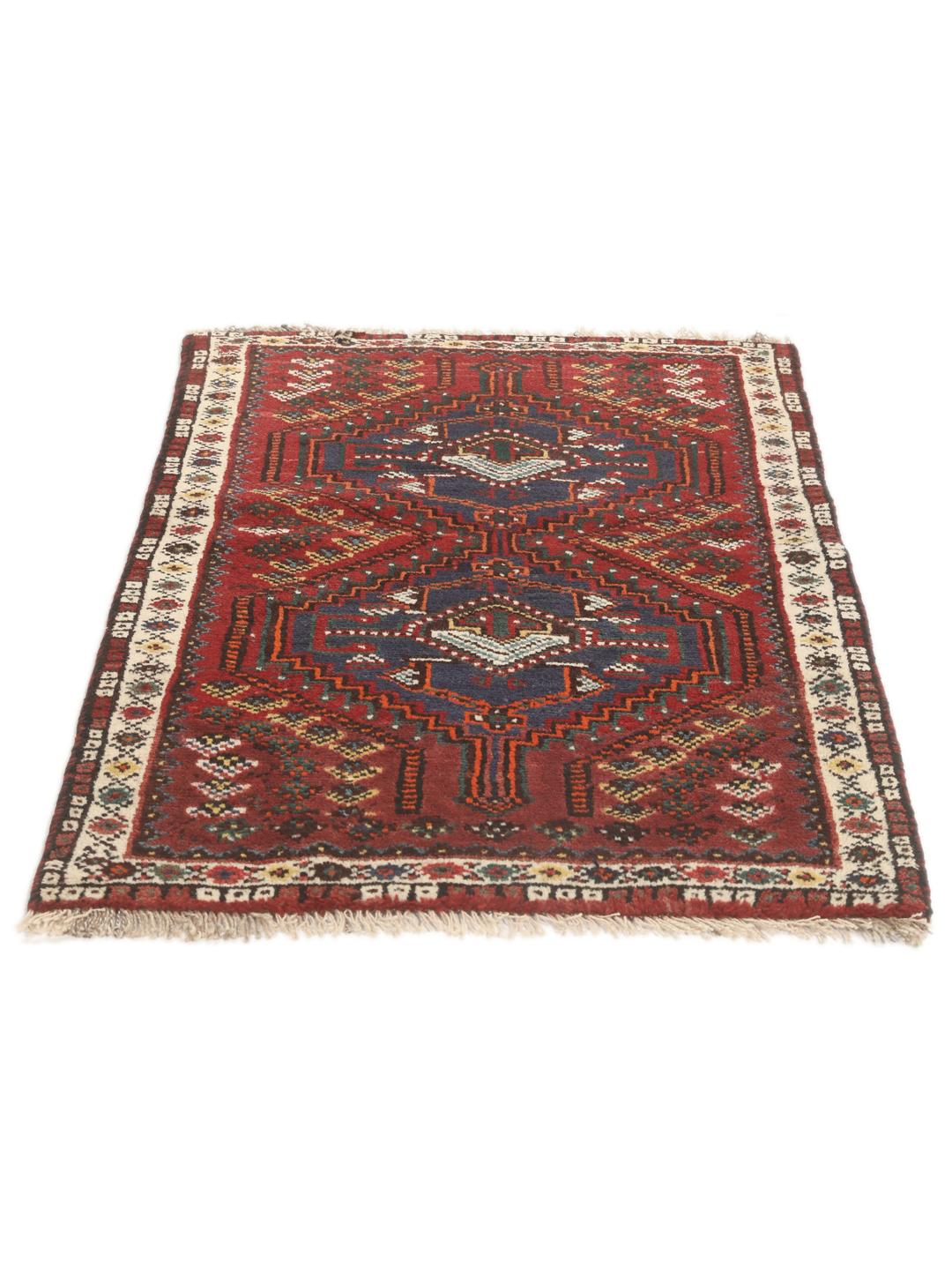 Hand-knotted Shiraz rug from the Middle East in deep red and blue tones