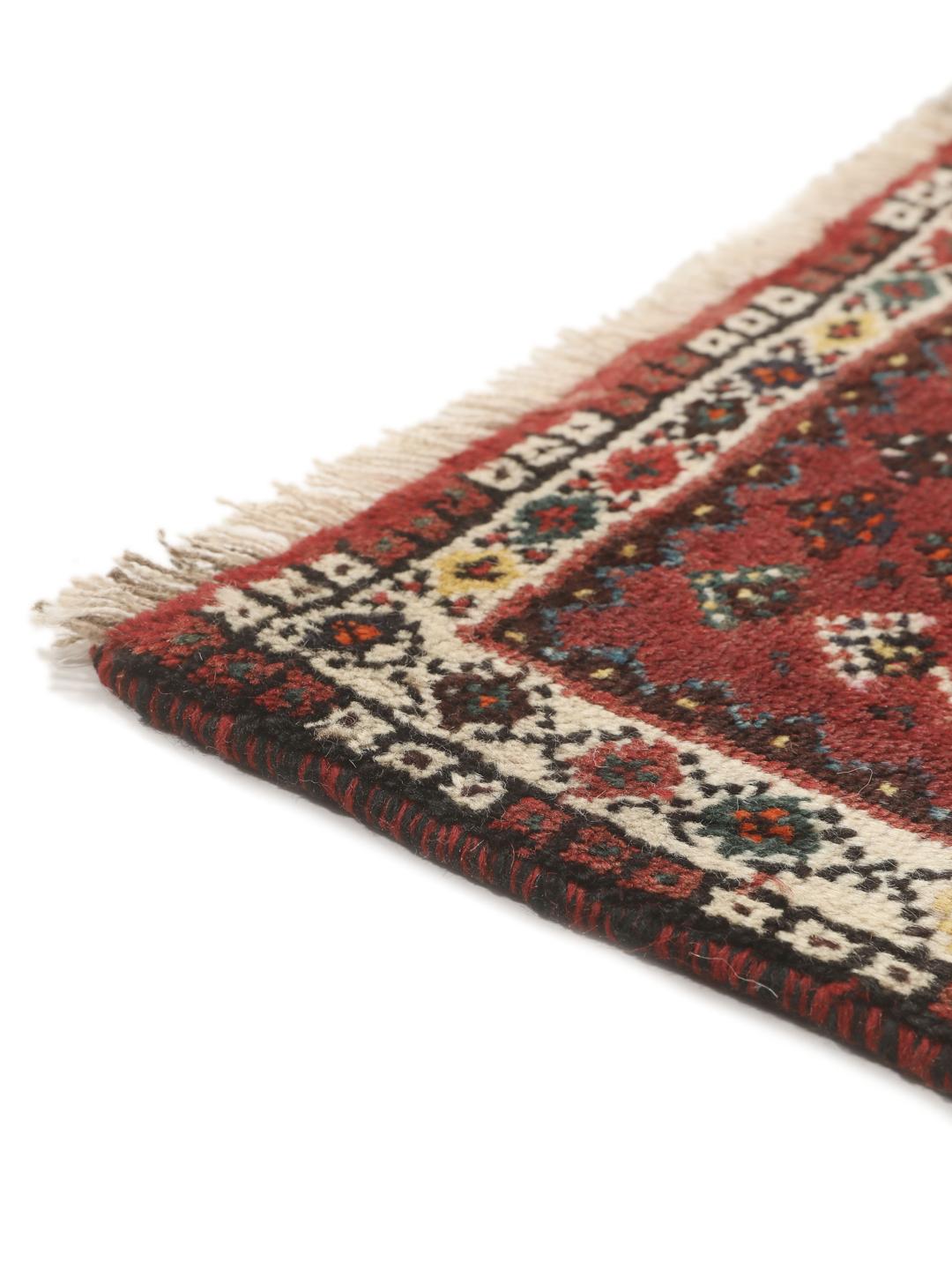 Hand-knotted Shiraz rug from the Middle East in deep red and blue tones