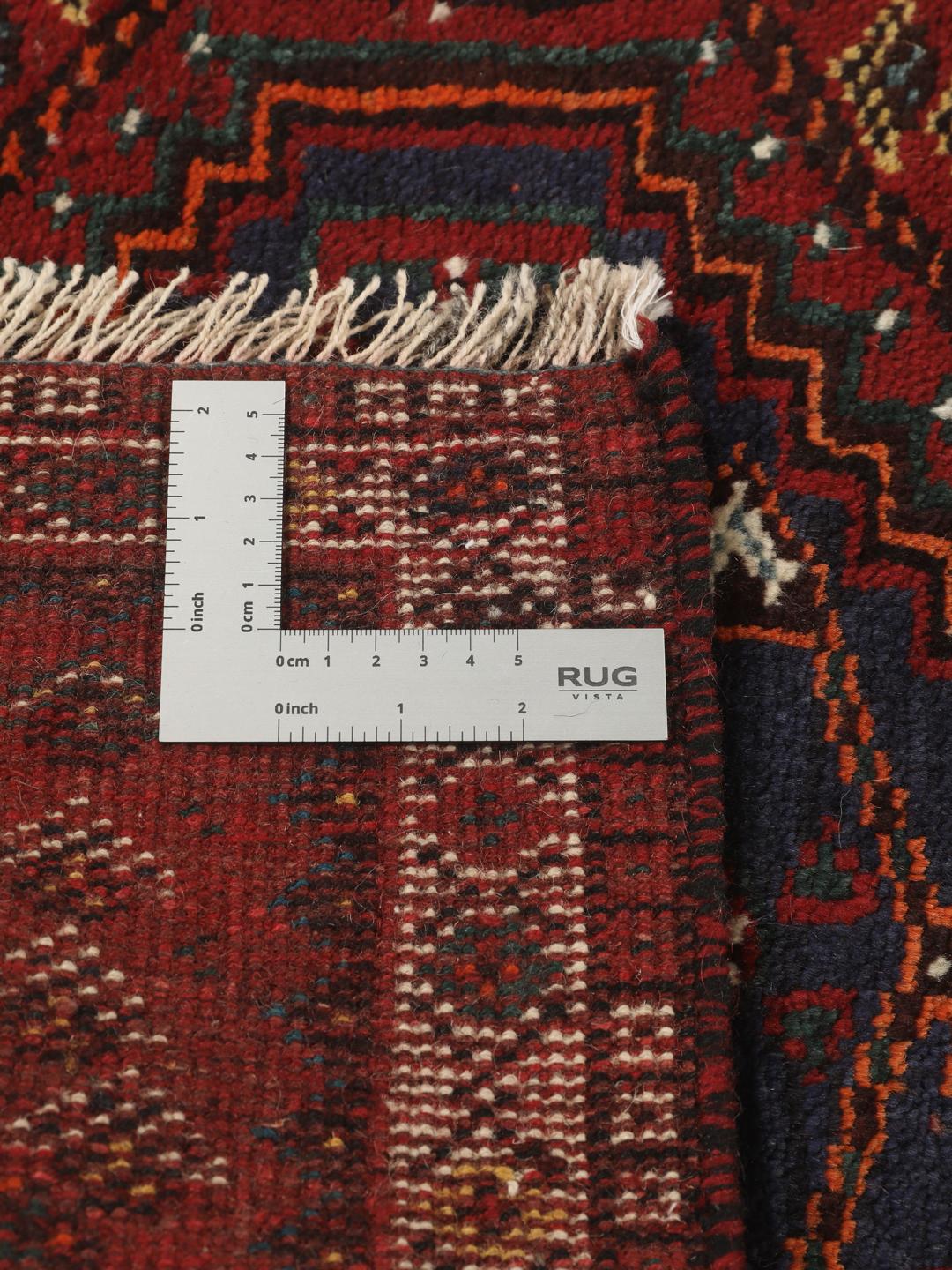 Hand-knotted Shiraz rug from the Middle East in deep red and blue tones