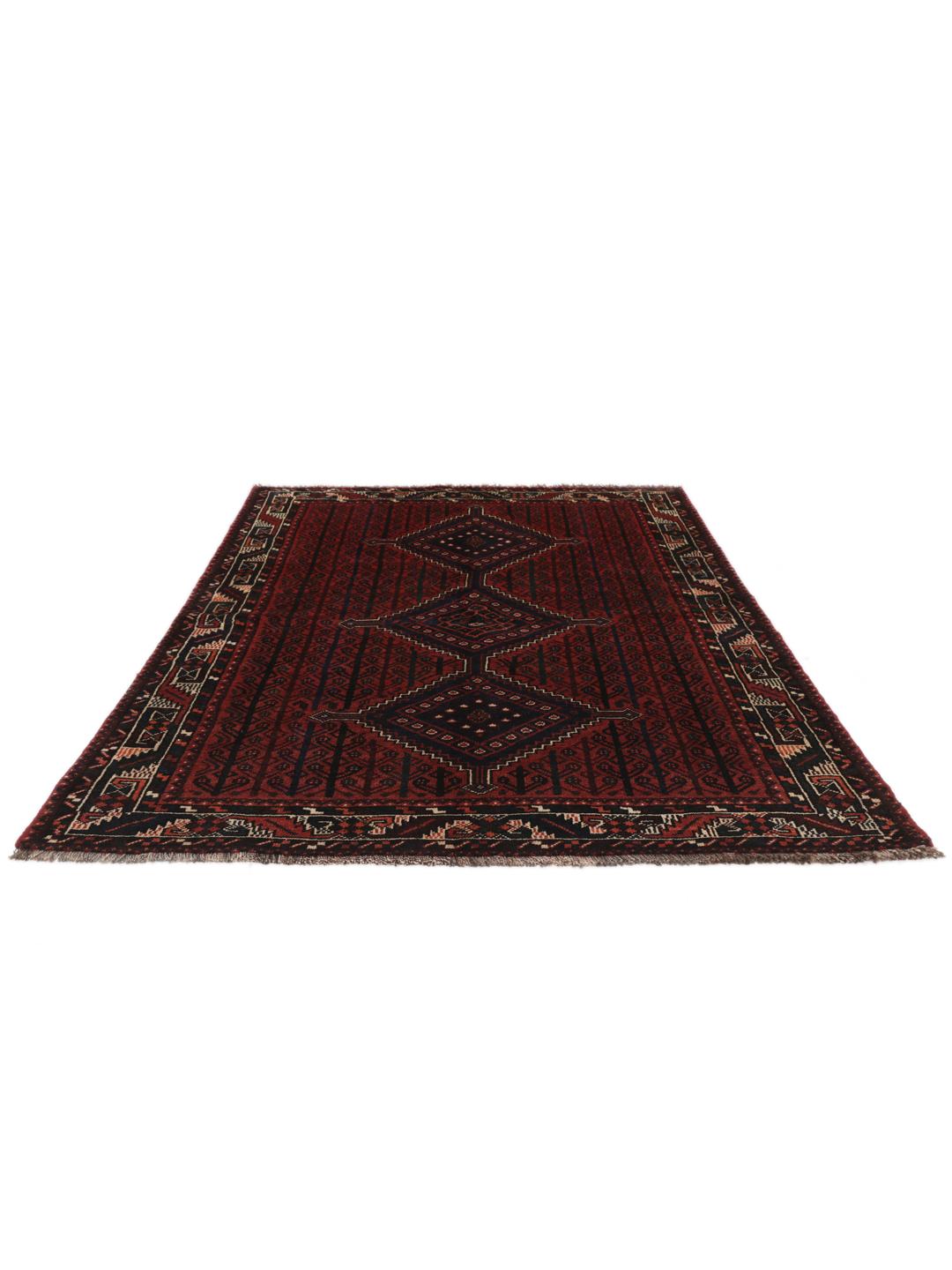 A hand-knotted Shiraz rug from the Middle East in dark-red and dark-blue tones.