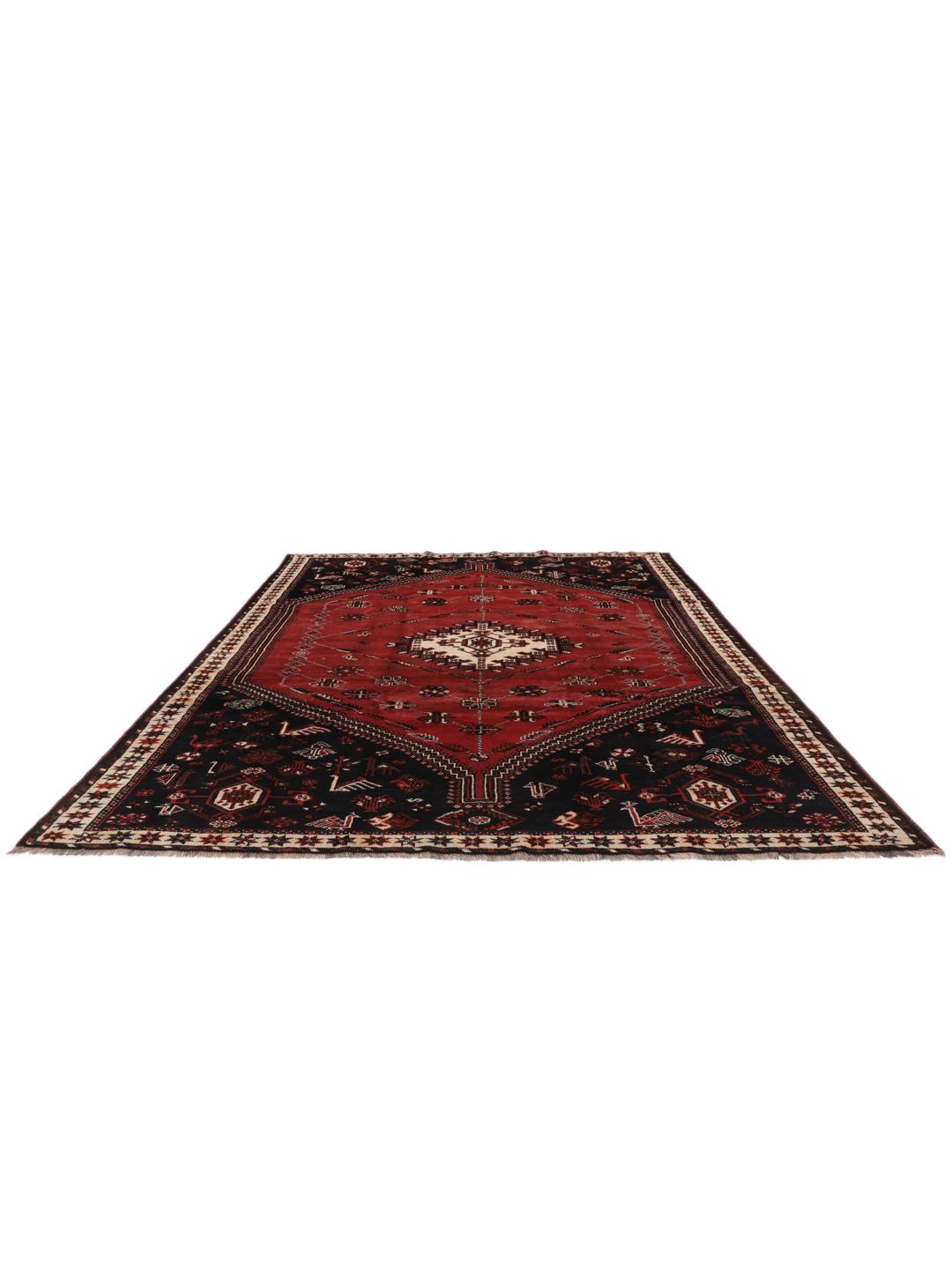 Hand-knotted Middle Eastern rug in red and black wool