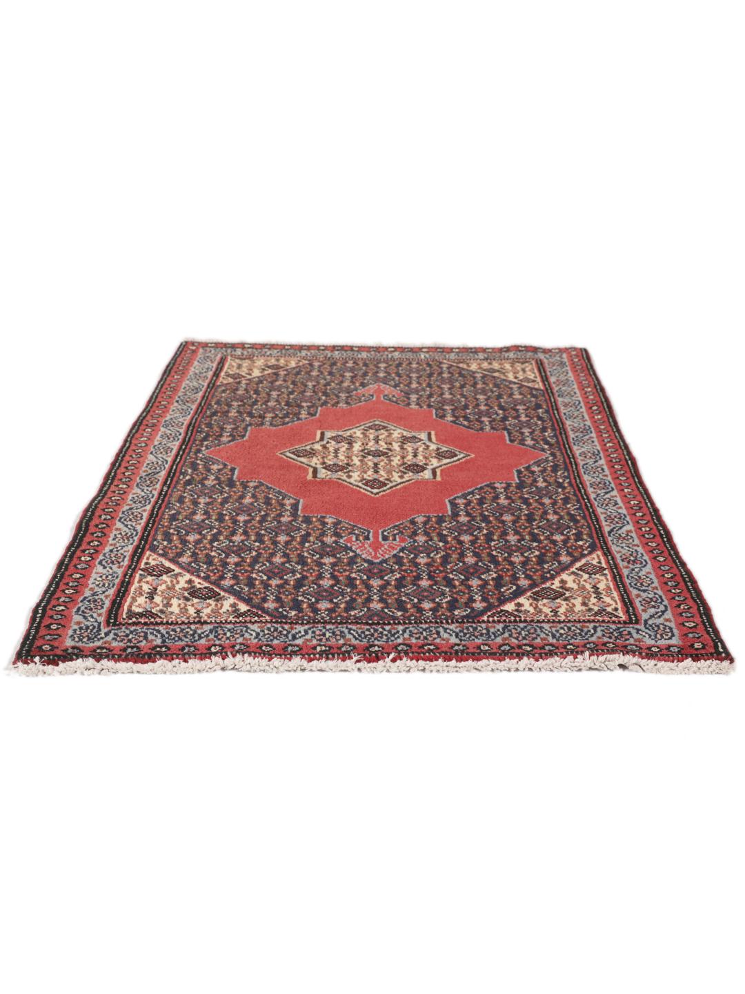 Ein handgeknüpfter Senneh-Teppich aus dem Nahen Osten mit einem roten und blauen geometrischen Design.