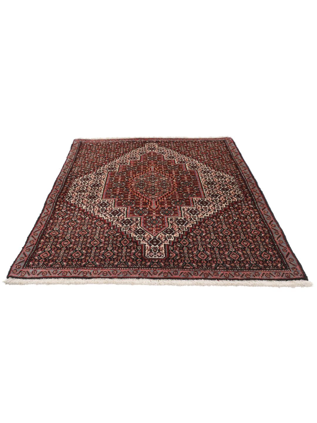 Hand-knotted Senneh rug from the Middle East in dark-red and black tones.