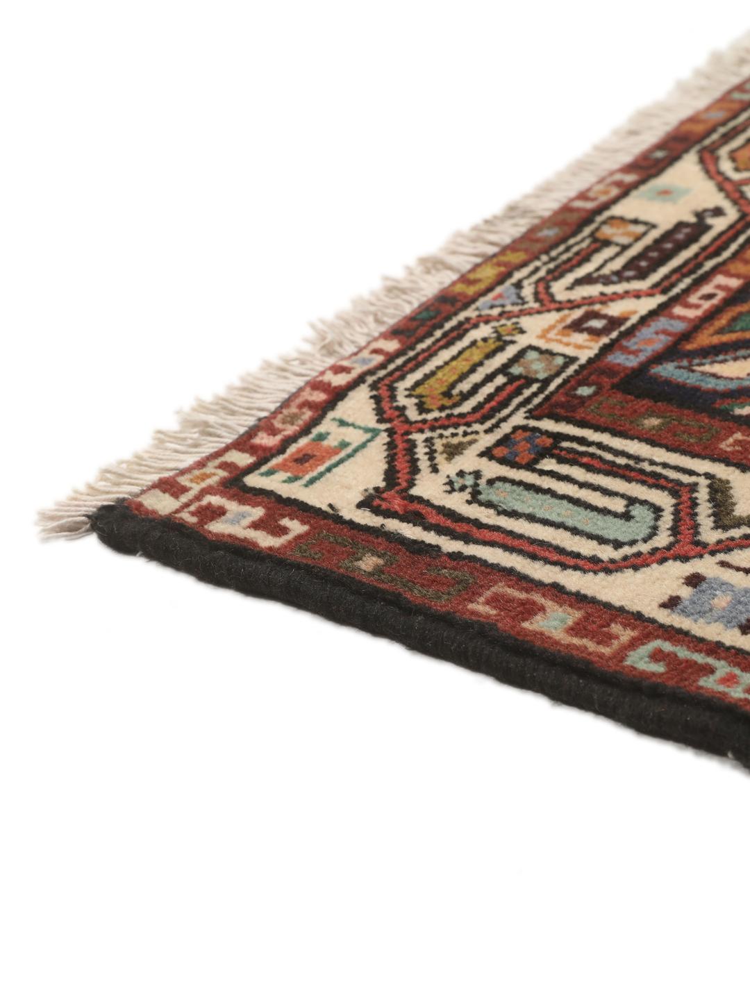 Handgeknoopte loper uit het Midden-Oosten in het rood met geometrische motieven