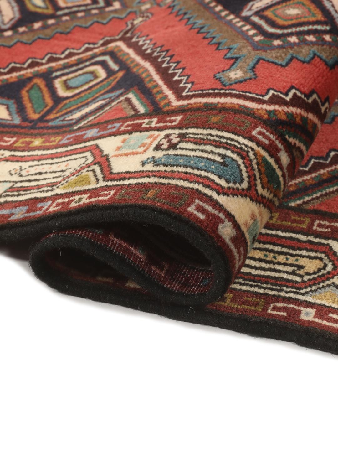 Handgeknoopte loper uit het Midden-Oosten in het rood met geometrische motieven