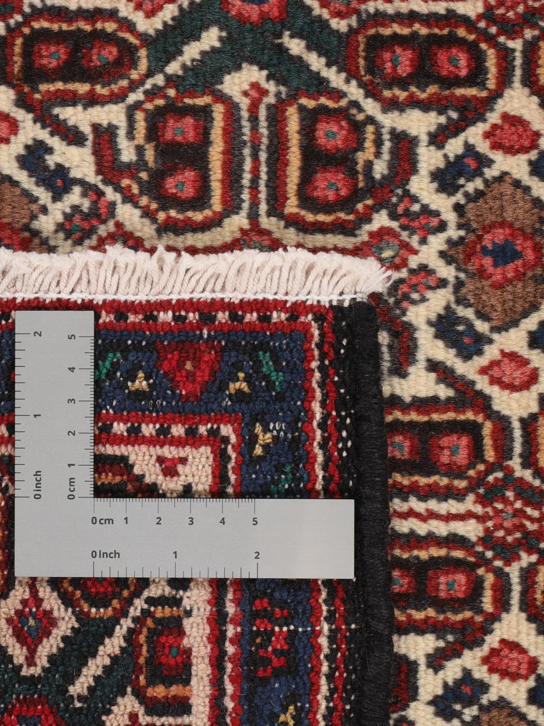 Handgeknoopt Senneh-tapijt uit het Midden-Oosten met een meerkleurig geometrisch patroon