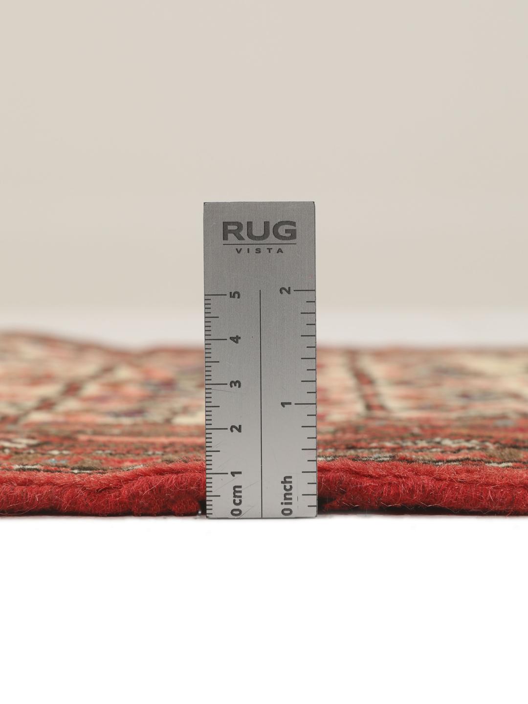 Handgeknoopte loper uit het Midden-Oosten met een rood en beige geometrisch patroon
