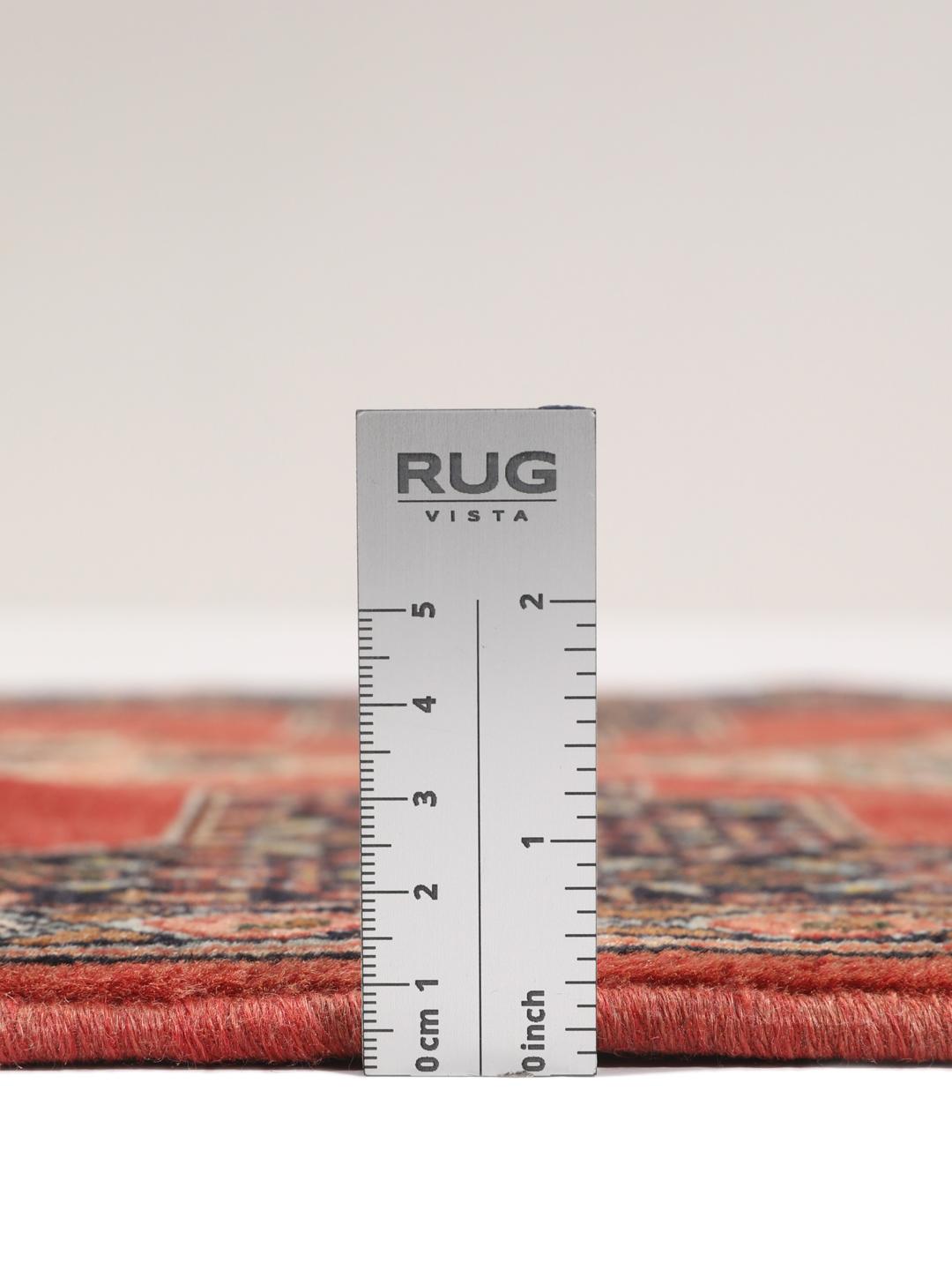 Hand-knotted Senneh rug from the Middle East in red and black