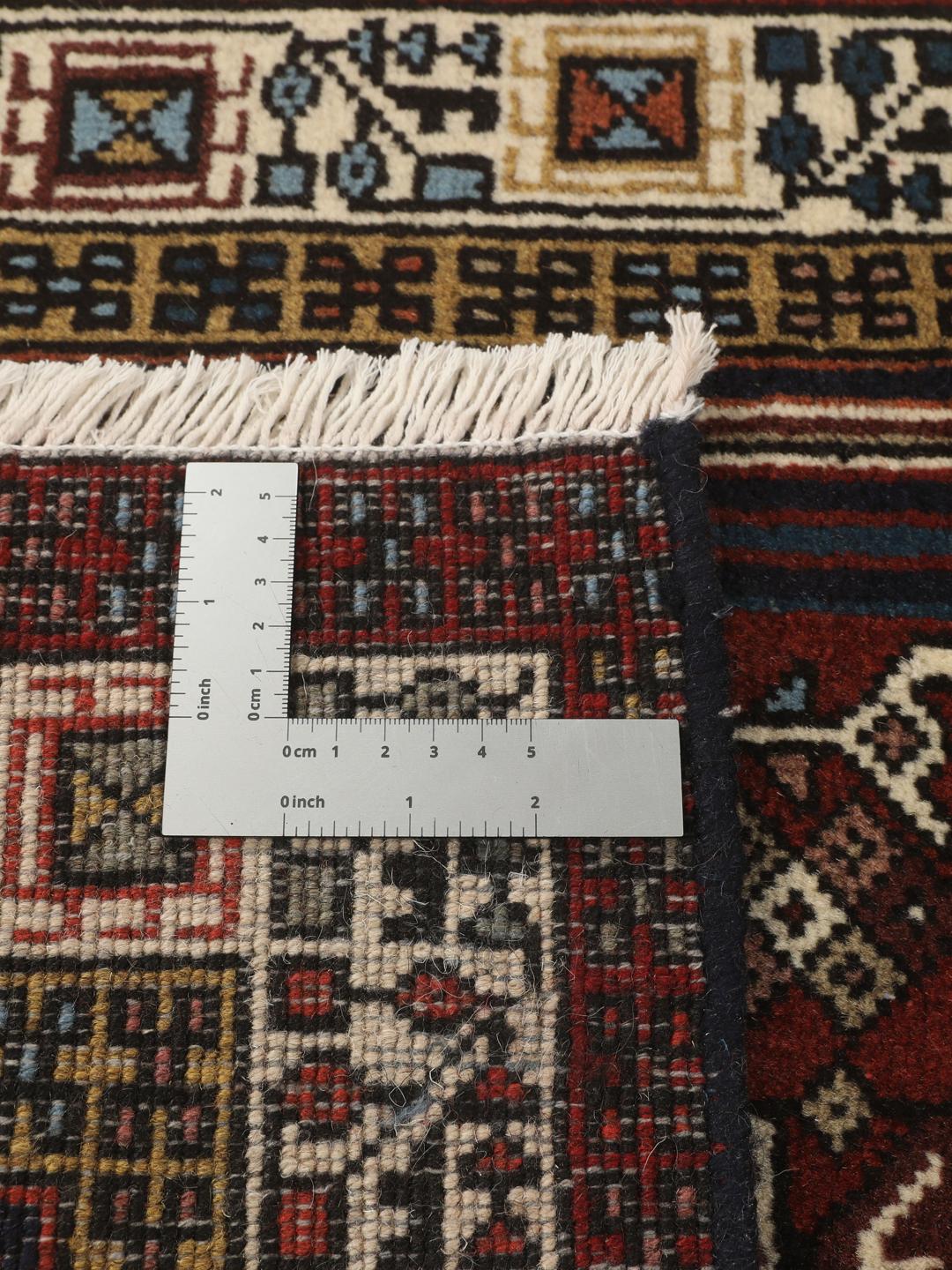 Handgeknoopte Ardebil wollen loper met geometrische medaillons in rode en blauwe tinten