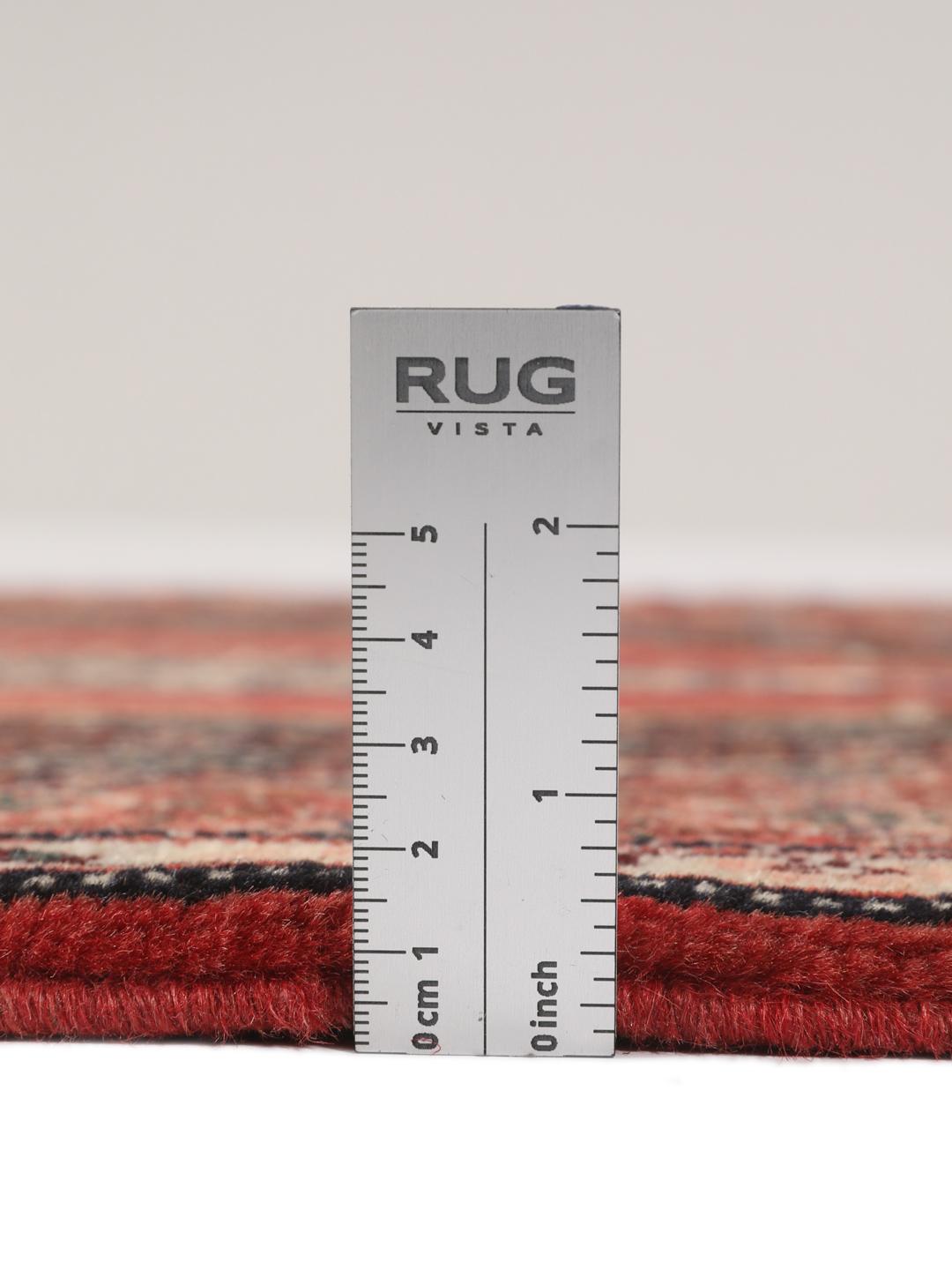 Handgeknüpfter Senneh-Teppich aus dem Nahen Osten in tiefen Rot- und Blautönen