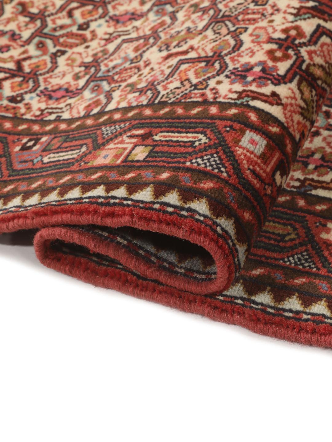 Handgeknoopte loper uit het Midden-Oosten in tinten rood en beige