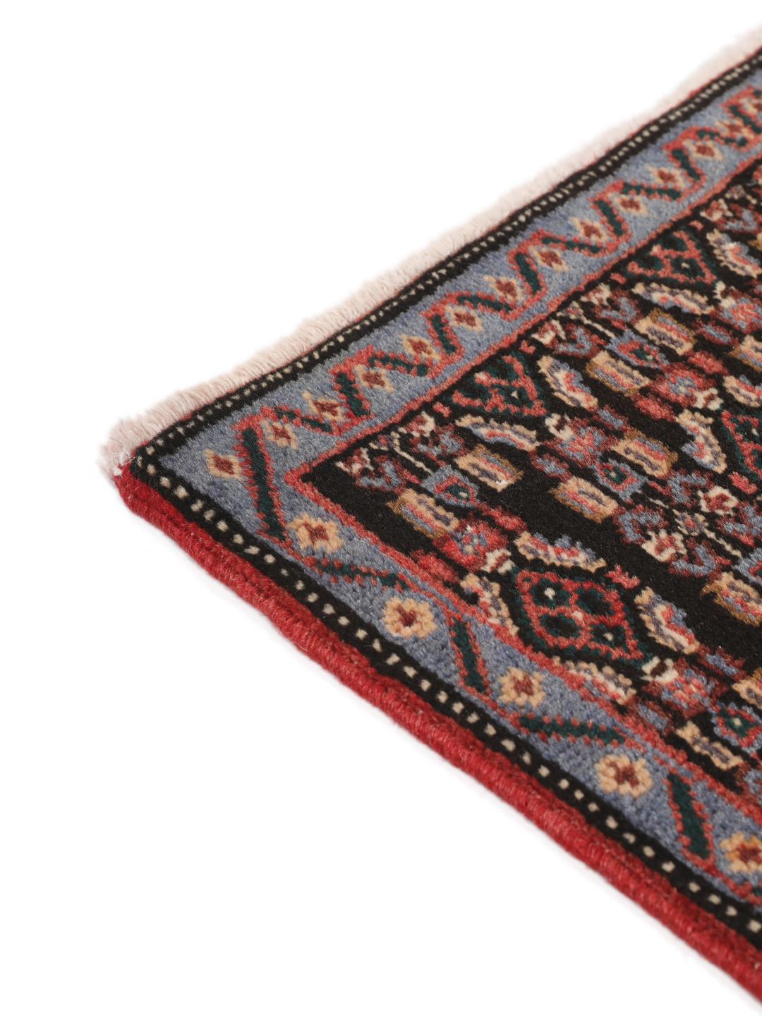Hand-knotted Senneh rug from the Middle East in multicolor