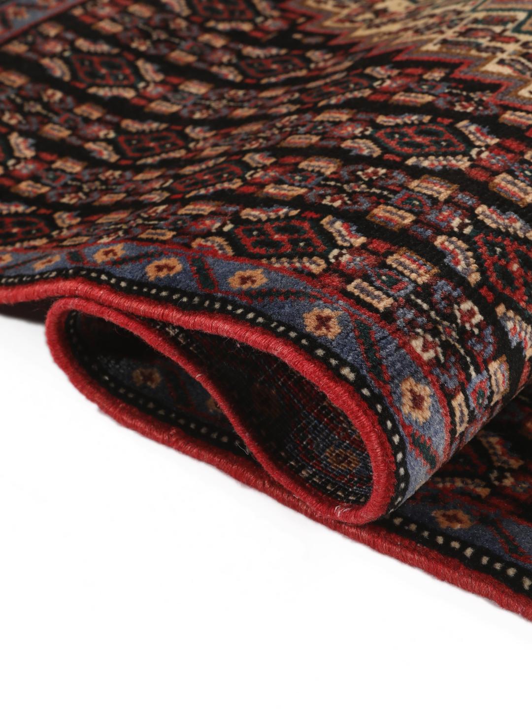 Hand-knotted Senneh rug from the Middle East in multicolor